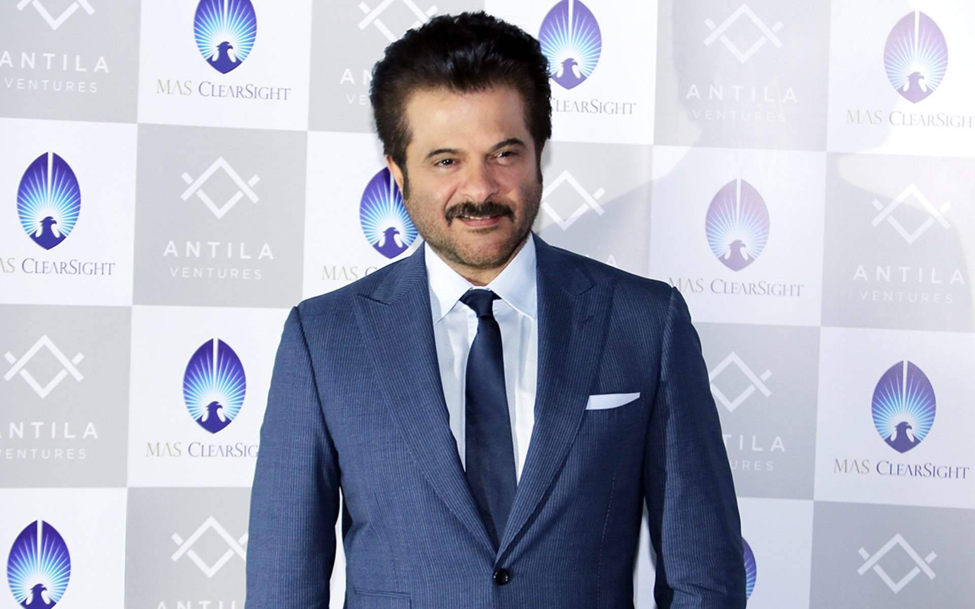 Anil Kapoor, blue pinstripe suit, branded event backdrop, Full HD Desktop Wallpaper