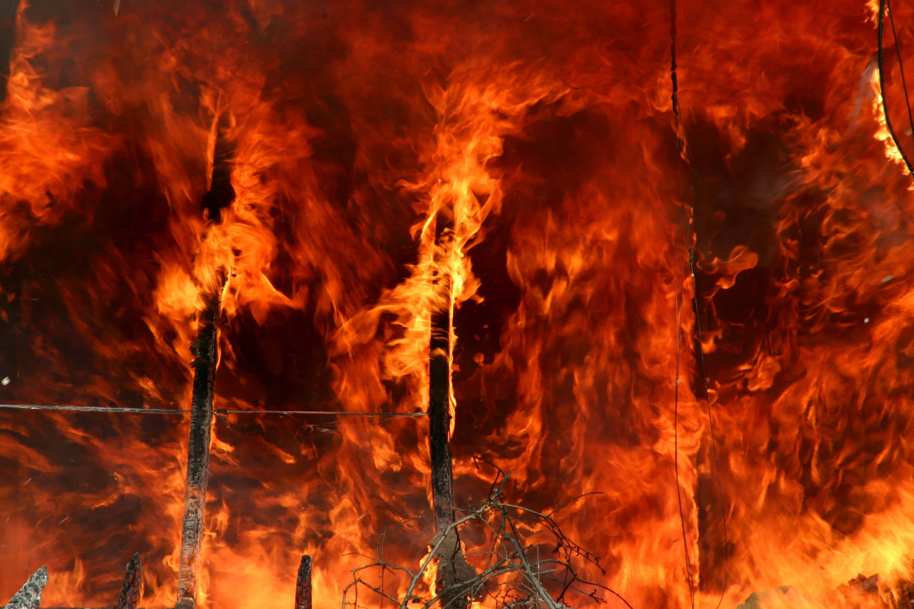 Anime Fire, orange flames, charred wooden posts, 2K Desktop Wallpaper