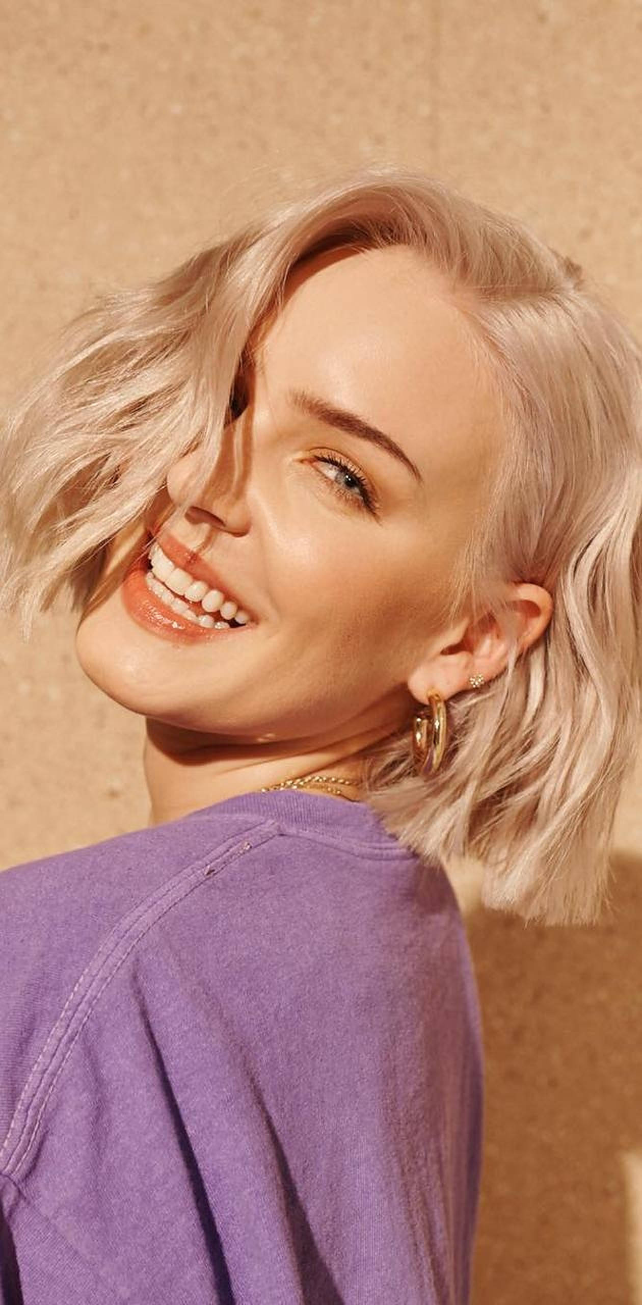 Anne Marie, blonde hair, purple top, 2K Phone Wallpaper