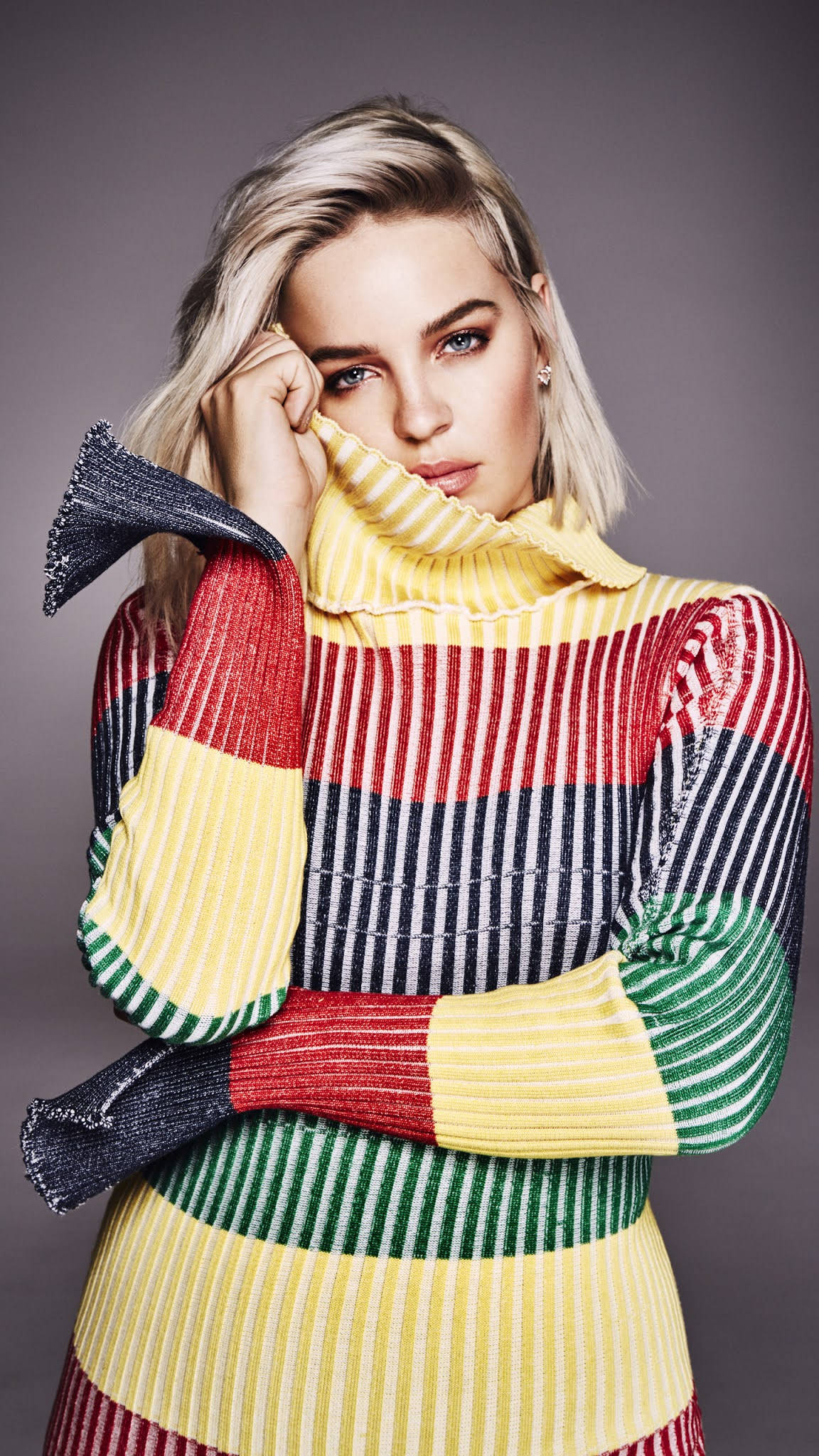 Anne Marie, colorful striped turtleneck sweater, blonde woman, Full HD Phone Wallpaper
