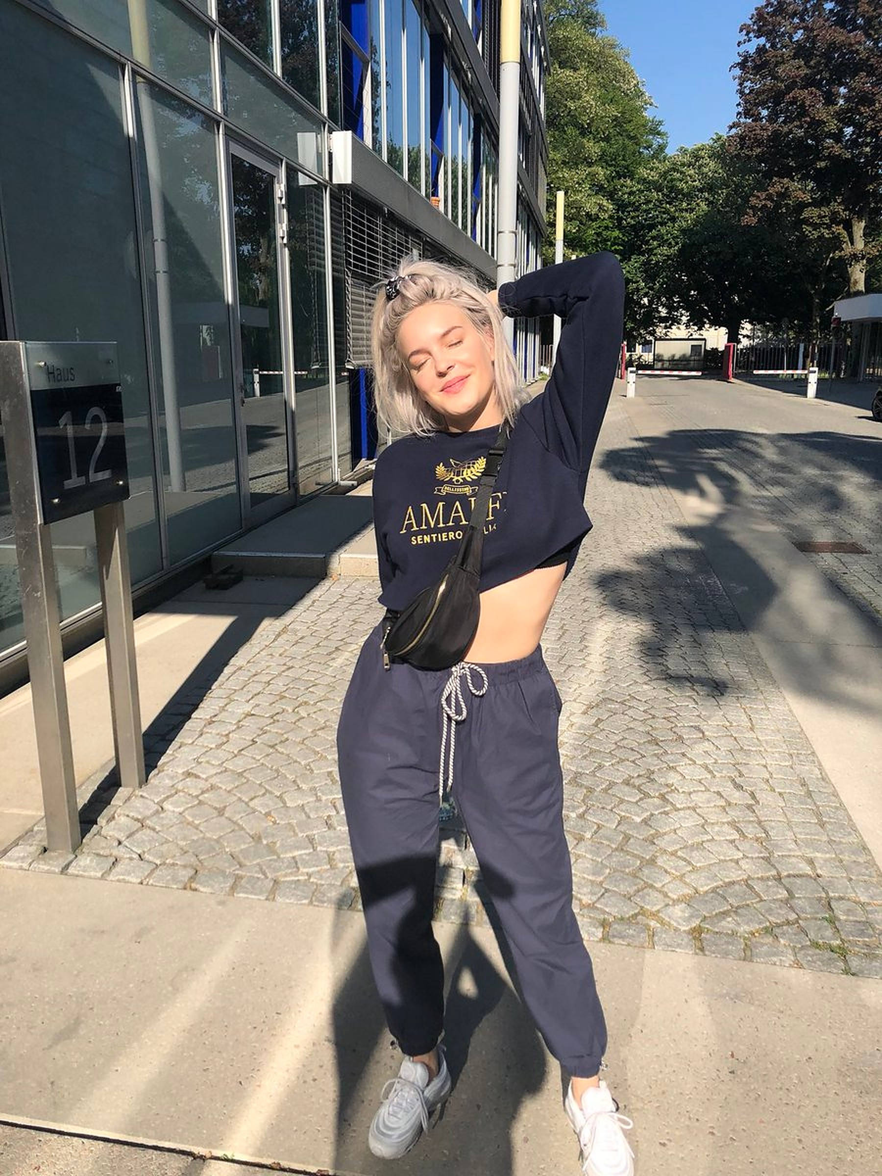 Anne Marie, platinum blonde hair, sunlit urban sidewalk, Full HD Phone Wallpaper