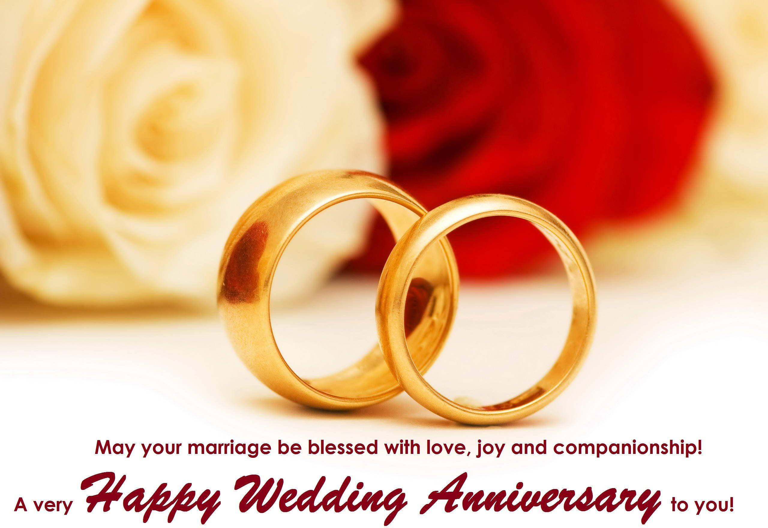 gold wedding rings, red and cream roses, celebratory anniversary text, 2K Desktop Wallpaper