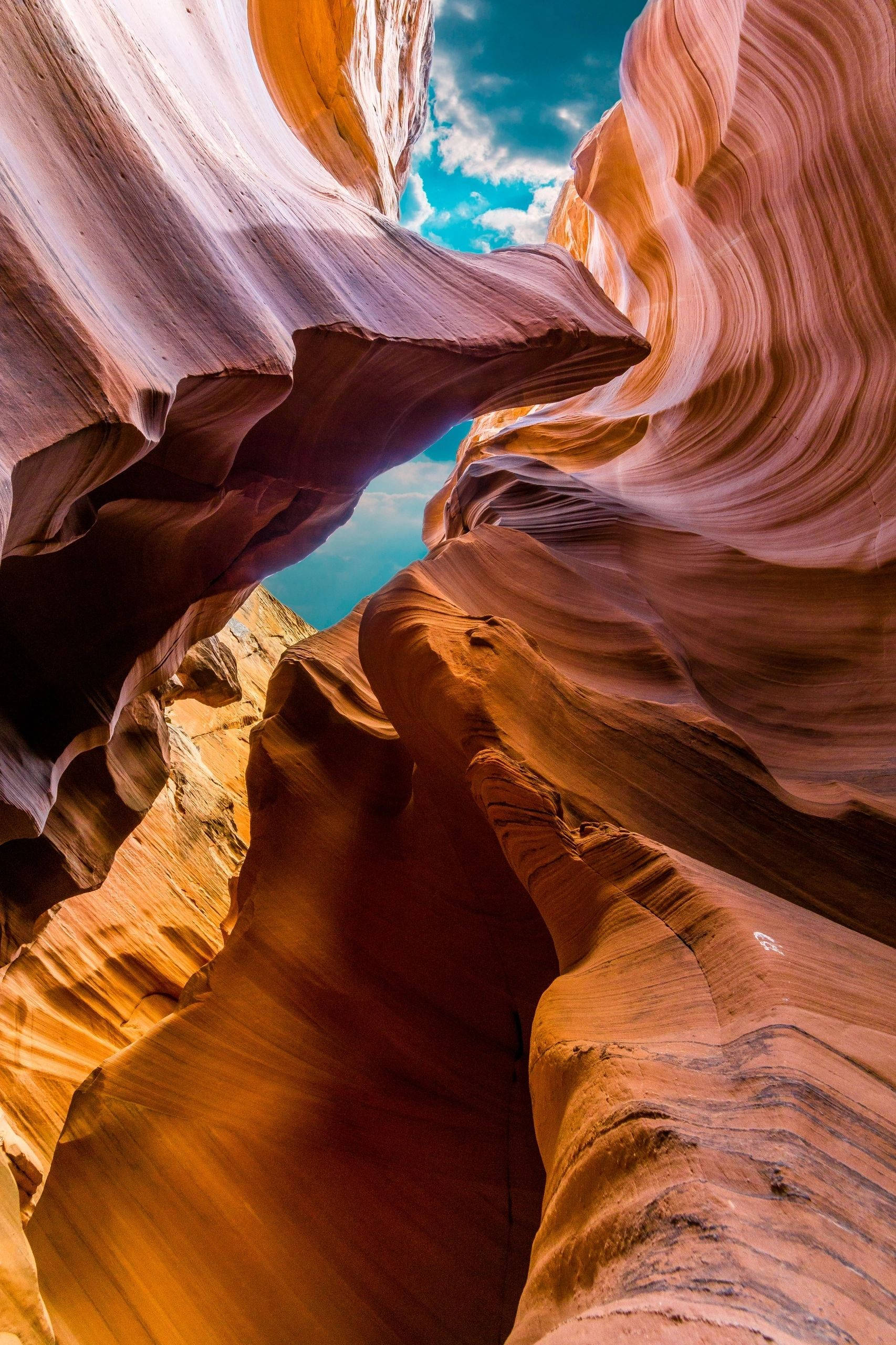 Antelope Canyon, blue sky, spiraling sandstone walls, 2K Phone Wallpaper