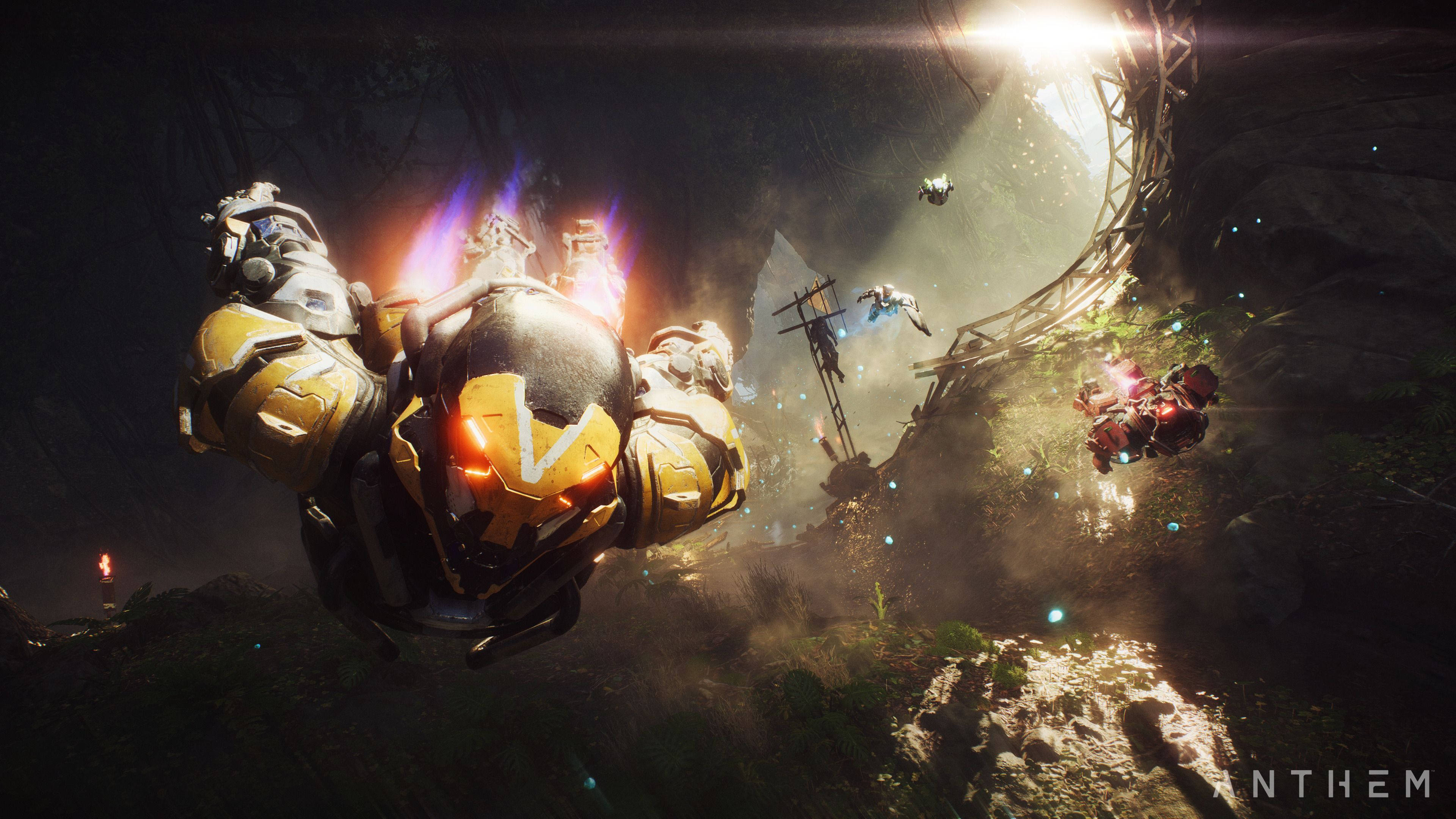 Anthem 4K, glowing yellow armored figure, dark cavern, 4K Desktop Wallpaper