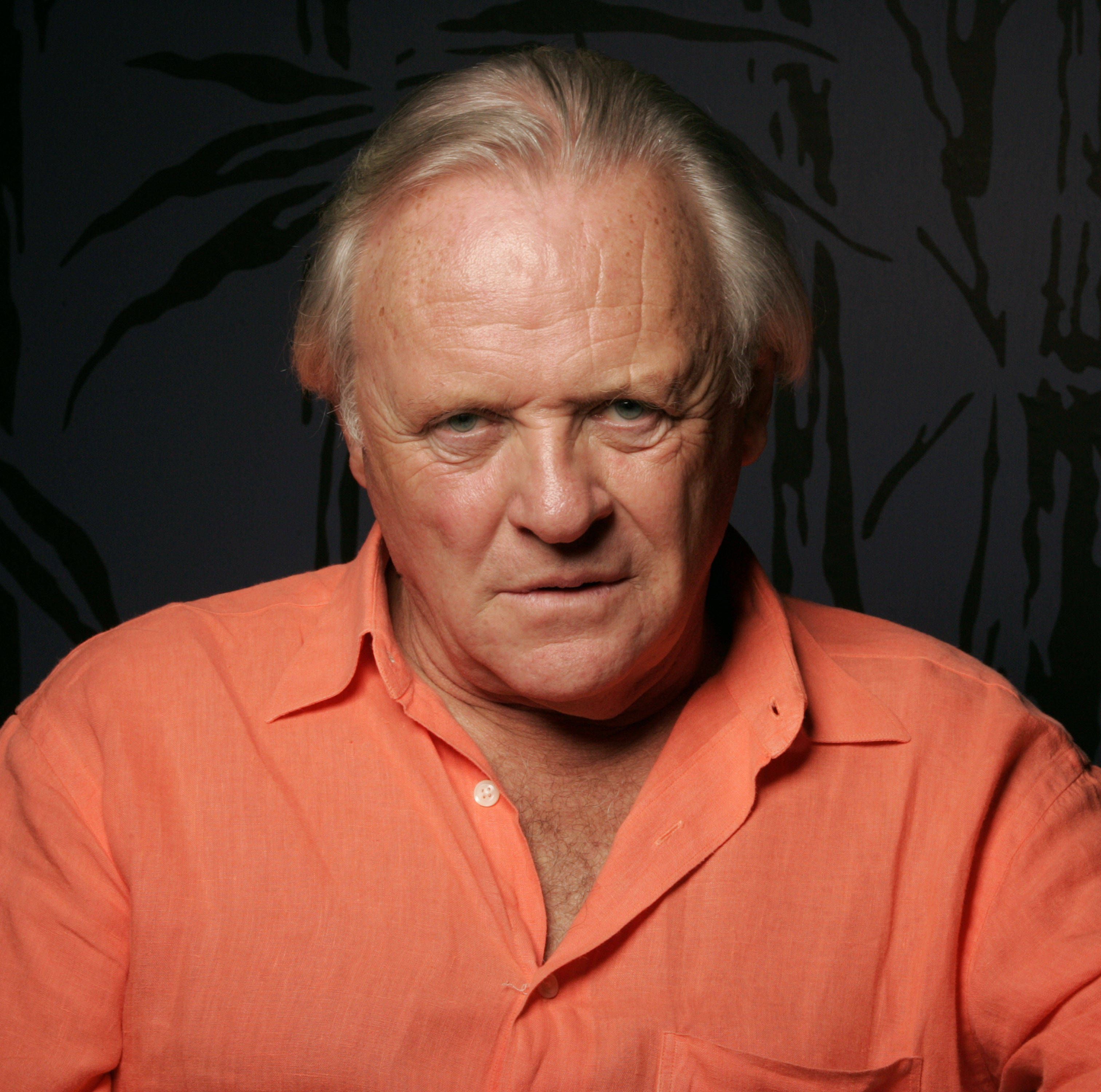 Anthony Hopkins, gray hair, intense blue eyes, 2K Desktop Wallpaper