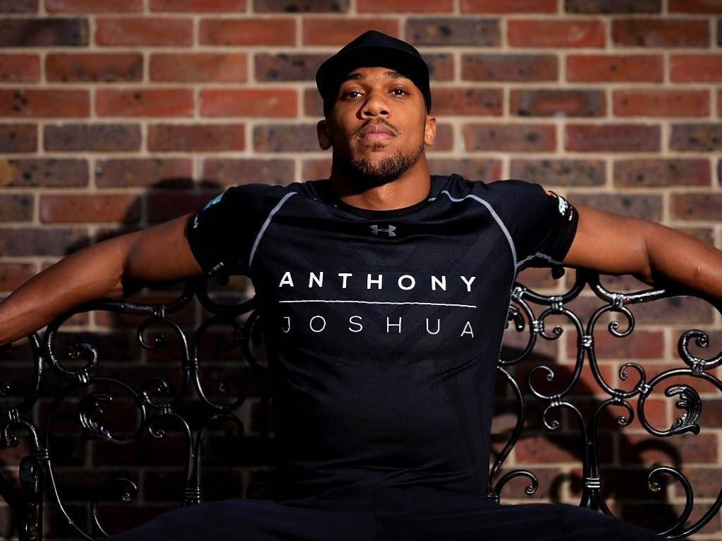 Anthony Joshua, black shirt, ornate bench, SD Desktop Wallpaper