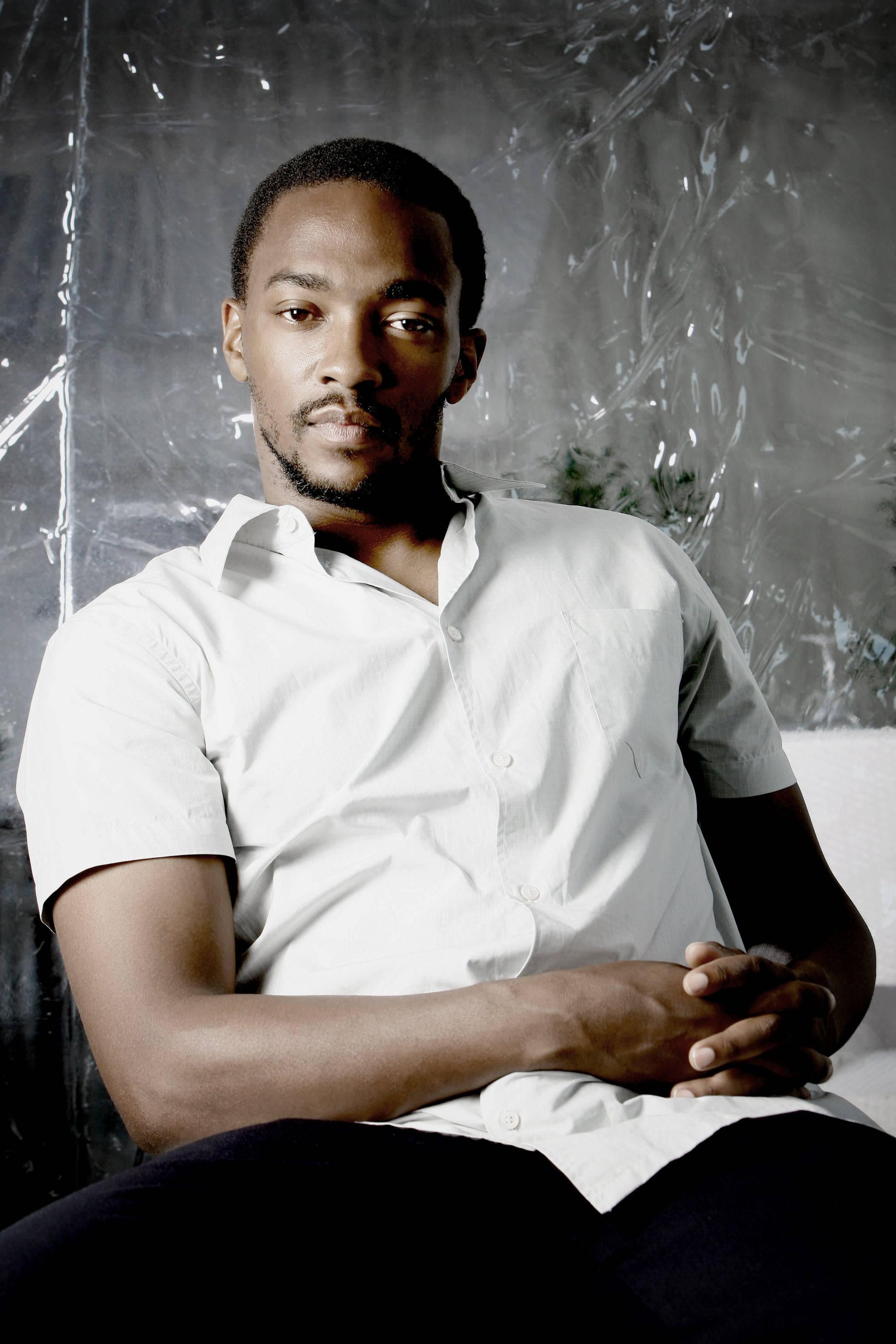 Anthony Mackie, white shirt, textured gray backdrop, 2K Phone Wallpaper