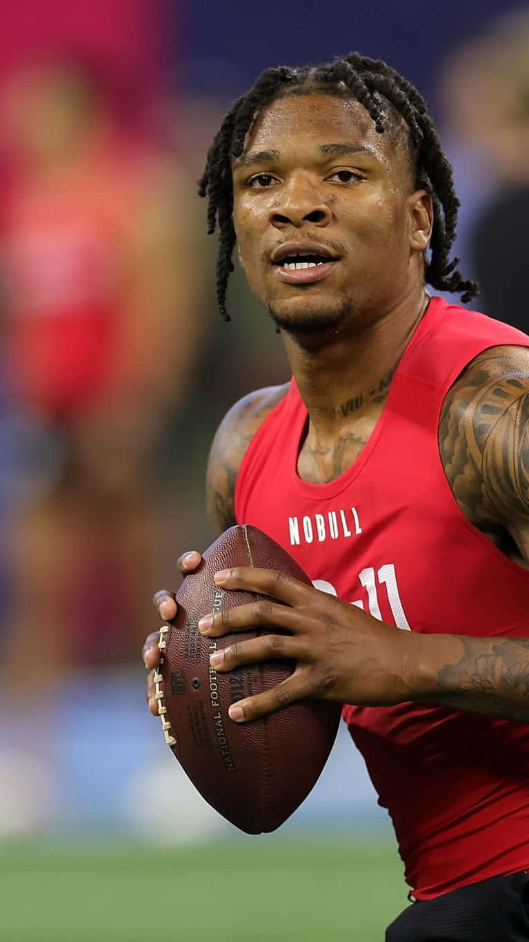 Anthony Richardson, red jersey, brown football, HD Phone Wallpaper