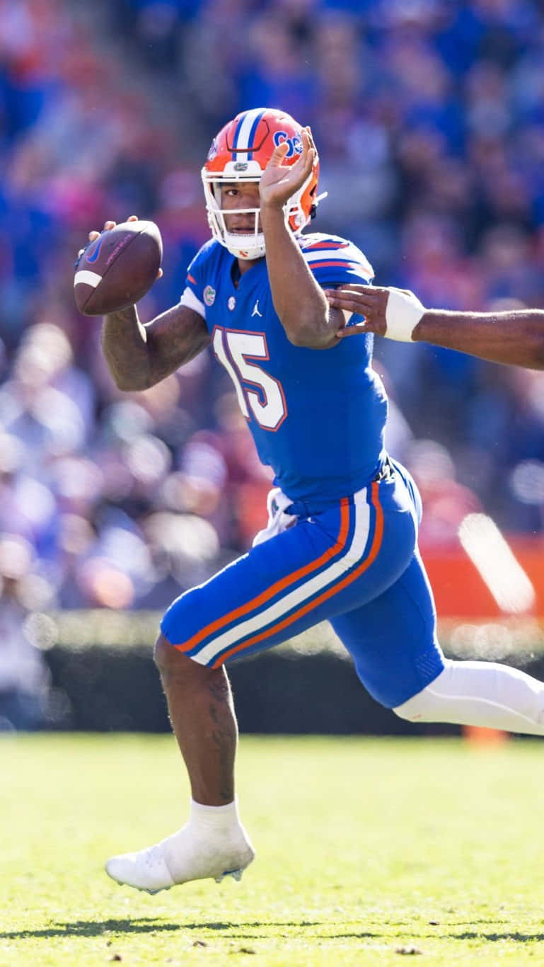 Anthony Richardson, blue and orange uniform, sunny daytime game, HD Phone Wallpaper