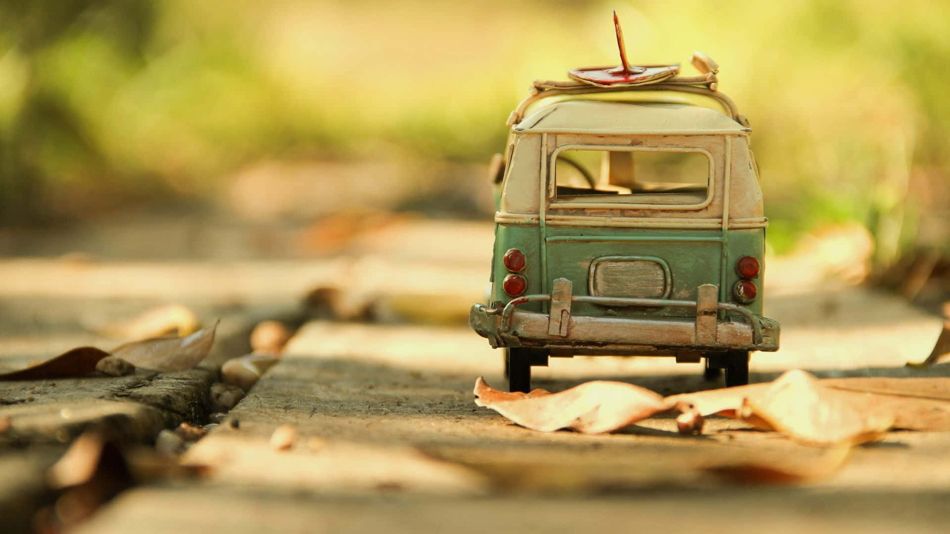 vintage green toy van, surfboard on roof, stone path, Full HD Desktop Wallpaper