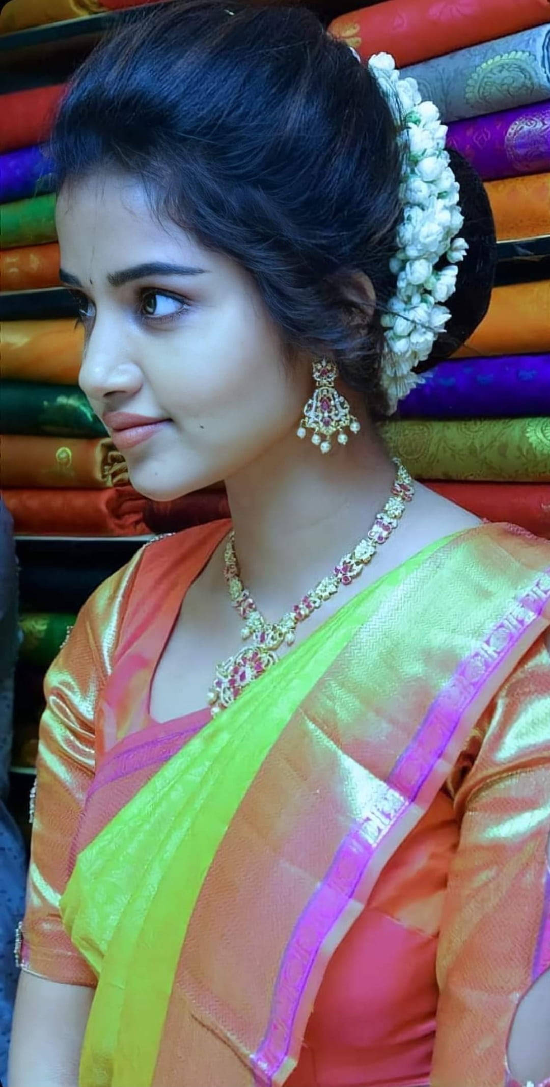 Anupama Parameswaran, flower hairstyle, vibrant orange and green saree, Full HD Phone Wallpaper