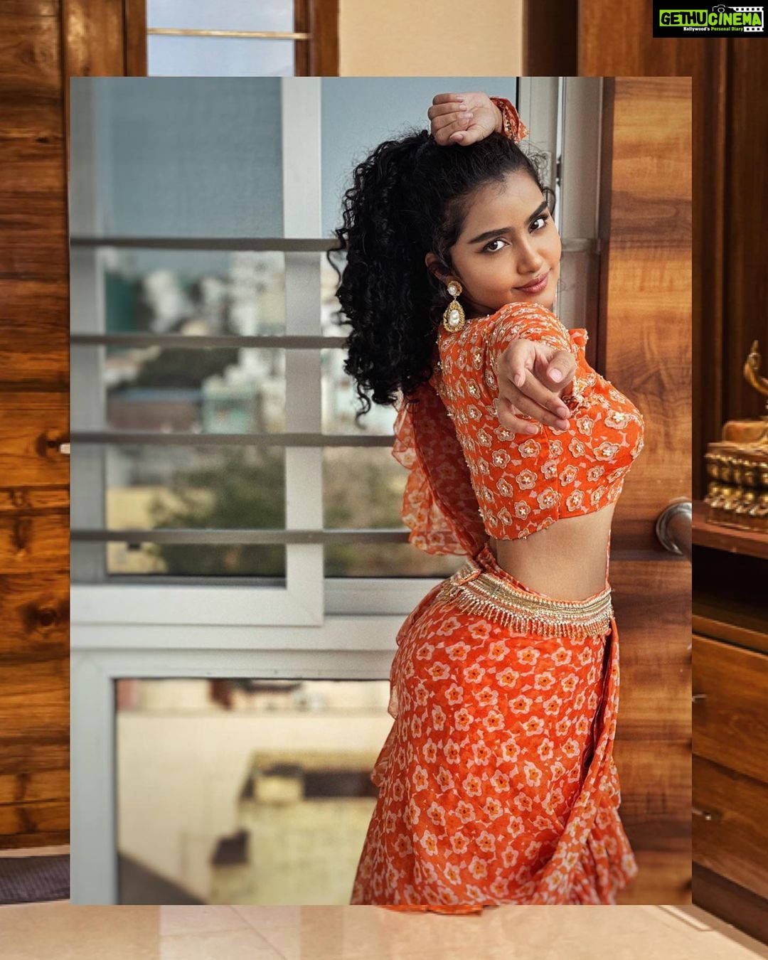 Anupama Parameswaran, floral outfit, vibrant orange patterned attire, HD Phone Wallpaper