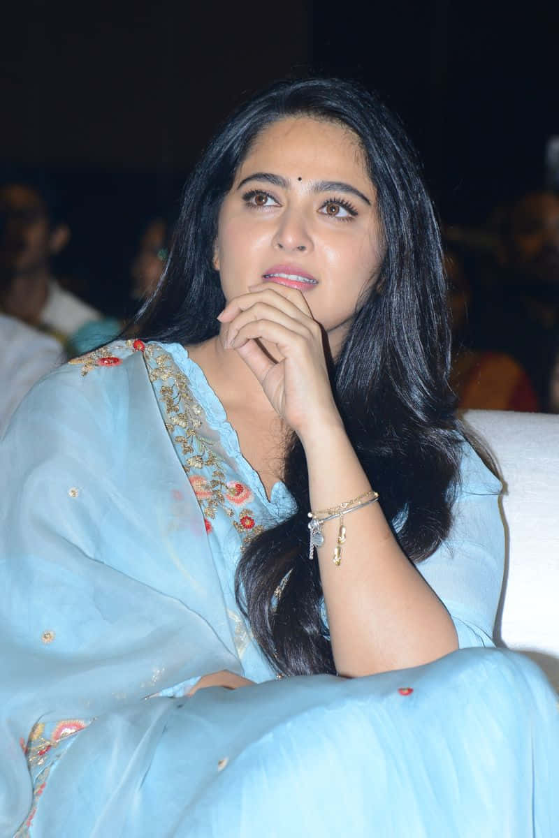 Anushka Shetty, contemplative look, light blue embroidered outfit, SD Phone Wallpaper