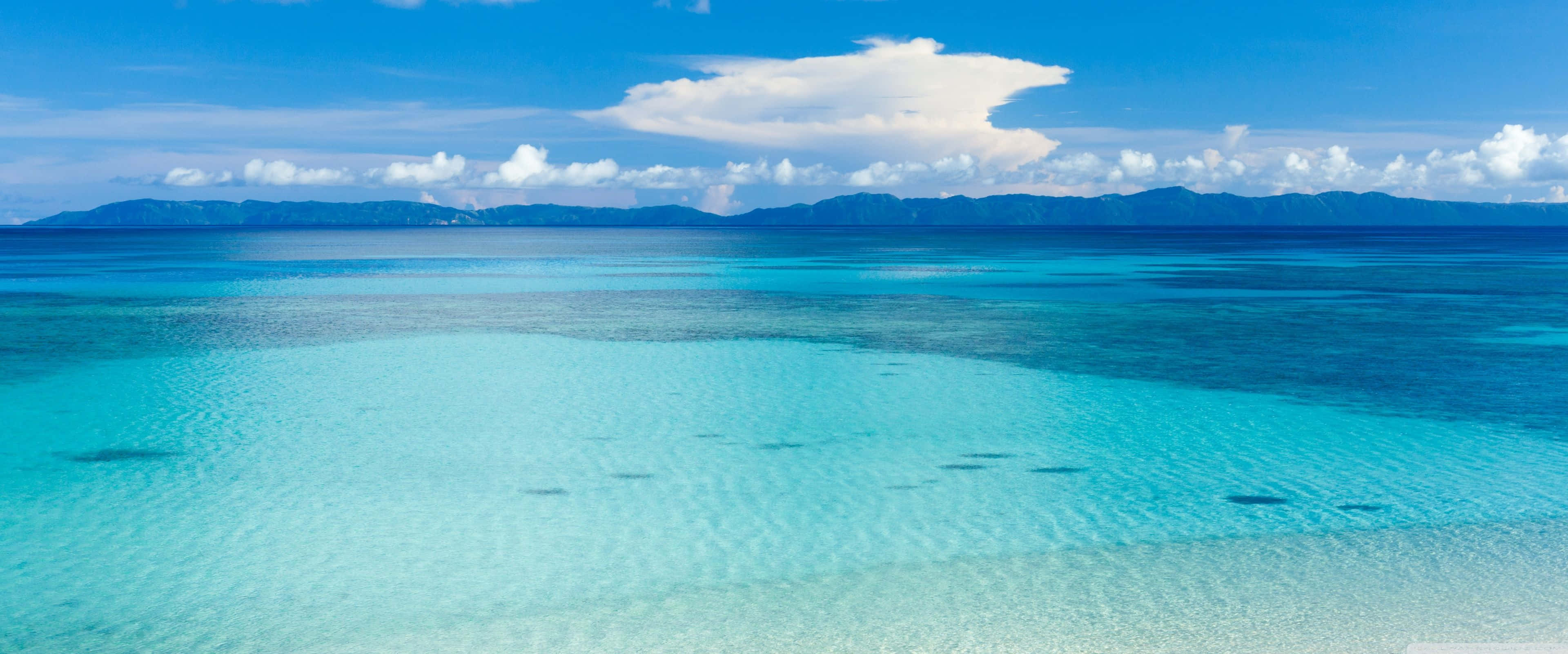 Apple 3840x1600, turquoise lagoon, gentle ripples, 4K Desktop Wallpaper