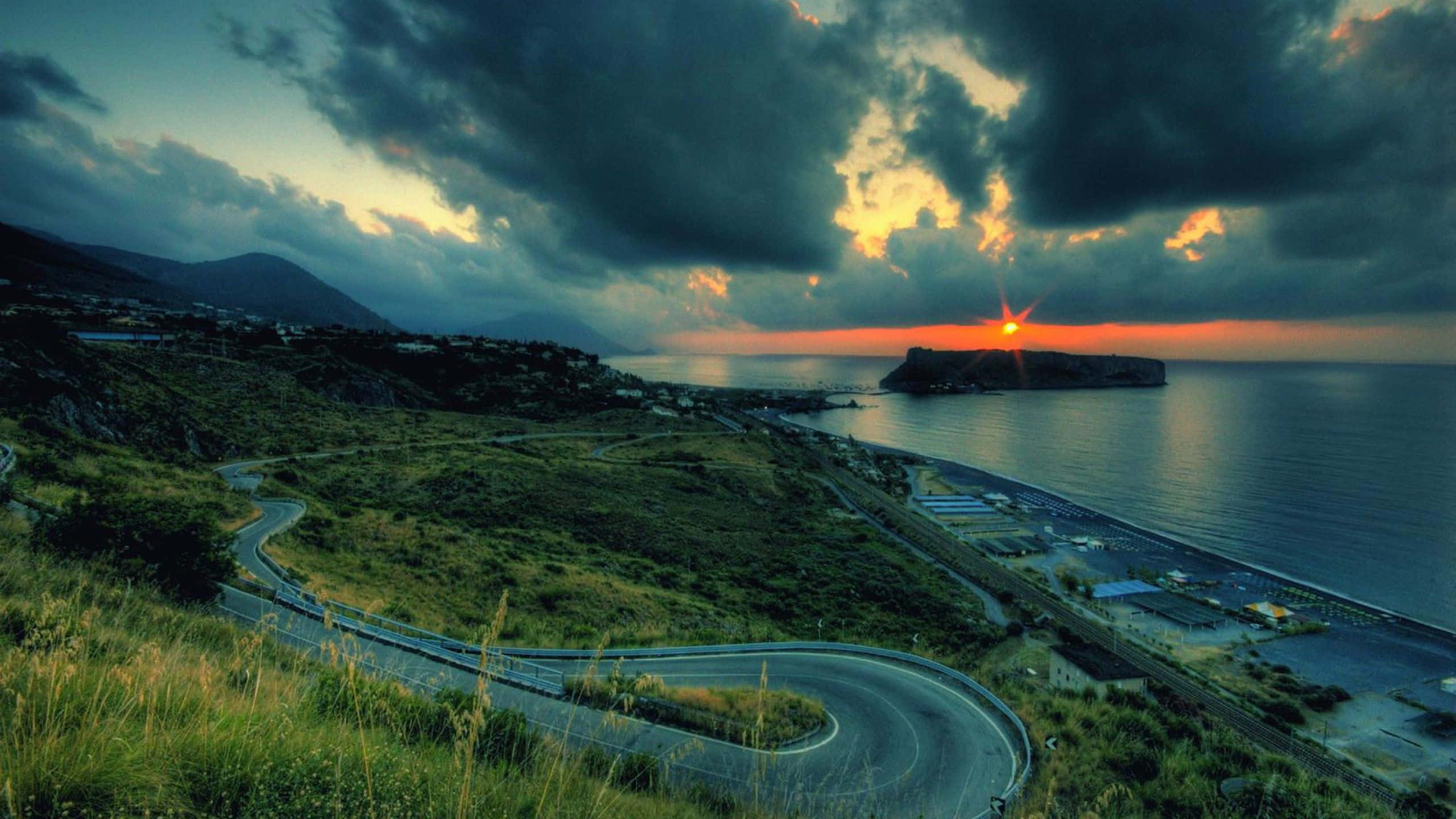 Apple Desktop, coastal road, green hills, 2K Desktop Wallpaper