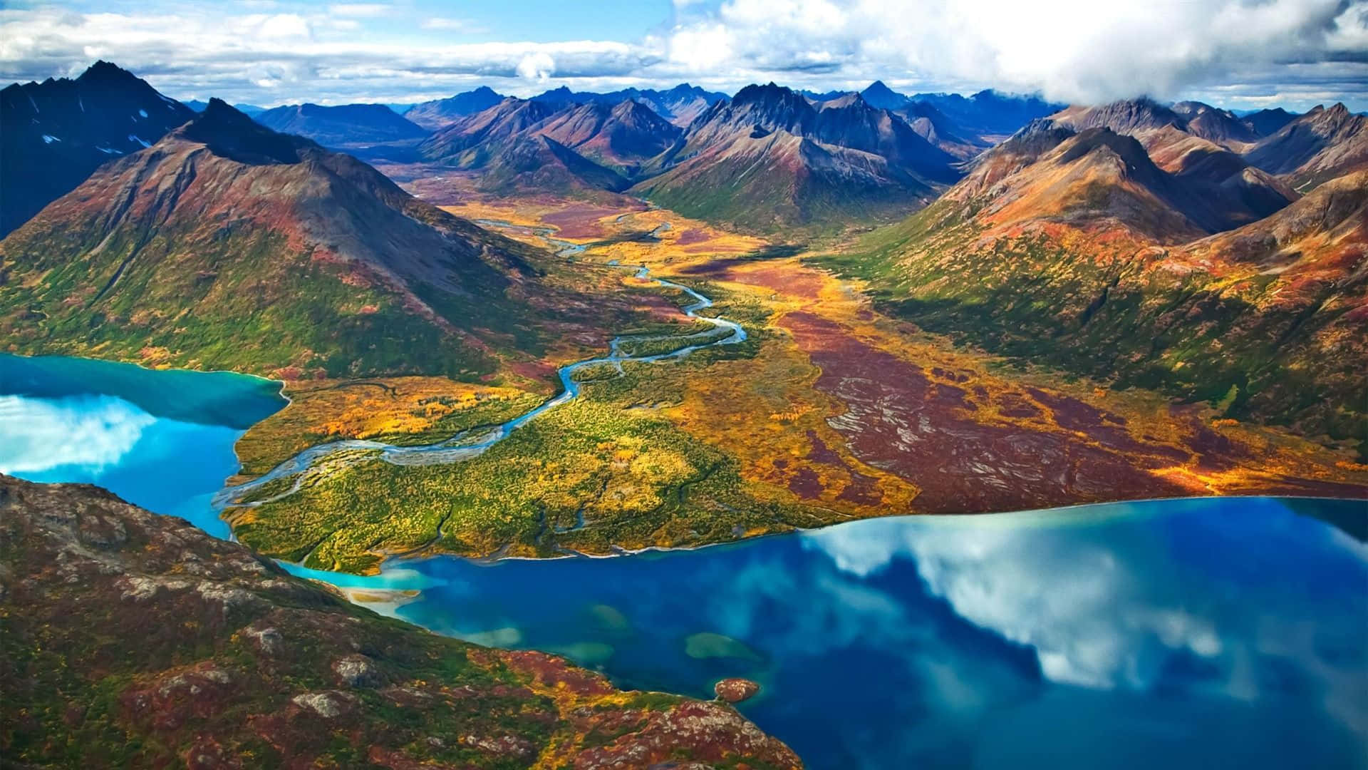 Apple Mac Desktop, autumn-colored valleys, rugged mountains, Full HD Desktop Wallpaper
