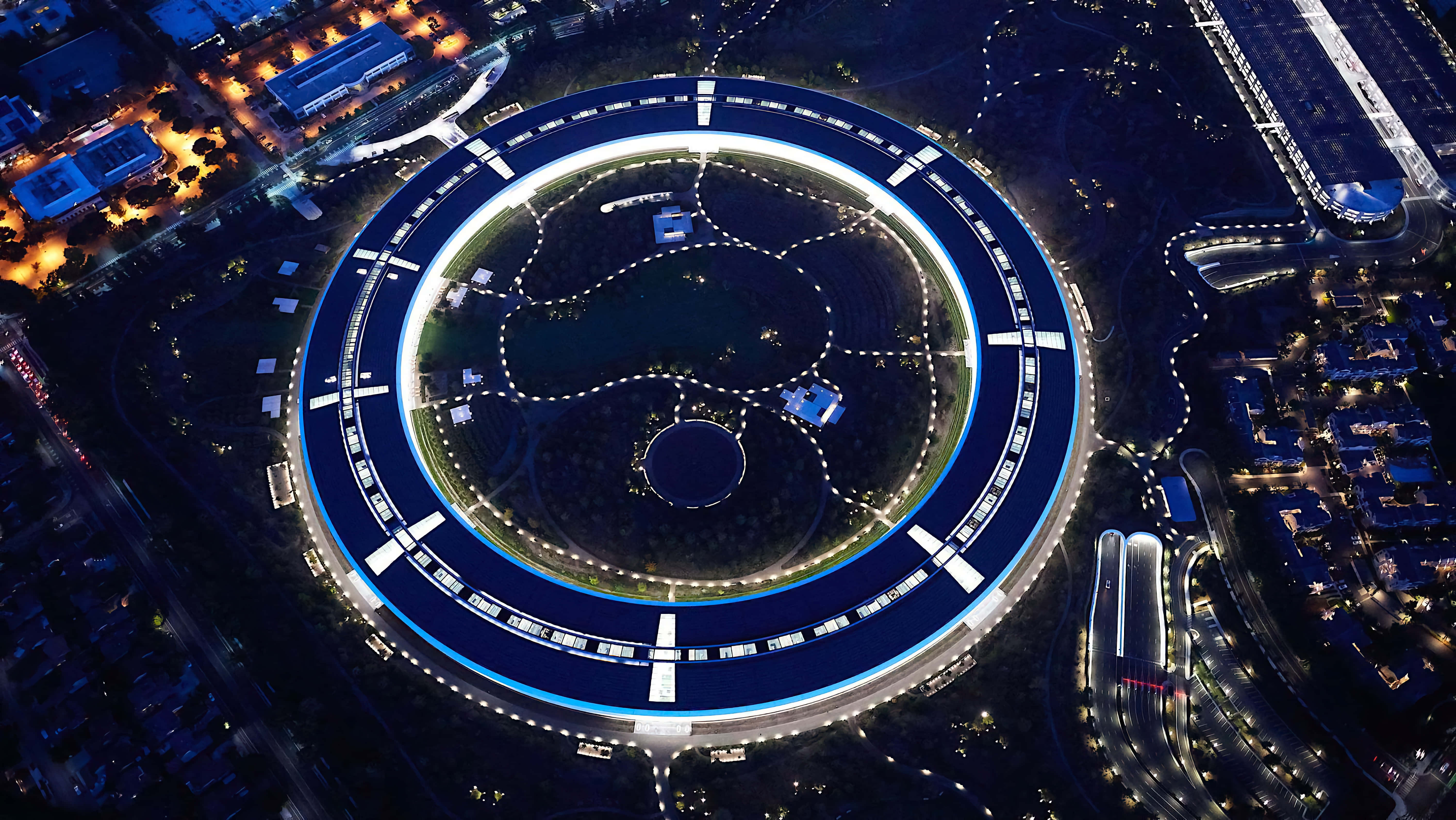 Apple Park, aerial night view, circular architectural complex, 5K Desktop Wallpaper