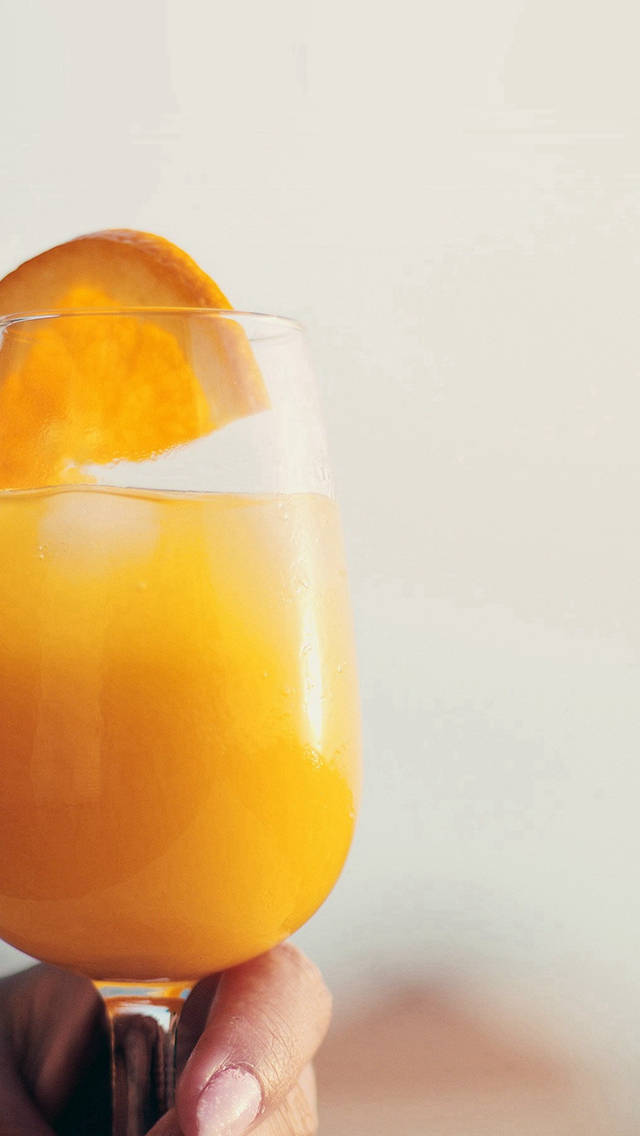 iPhone, vibrant orange juice, ice, SD Phone Wallpaper