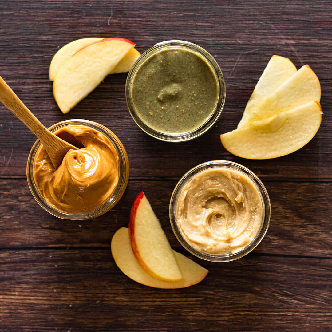 apple slices, peanut butter, wooden spoons, SD Desktop Wallpaper