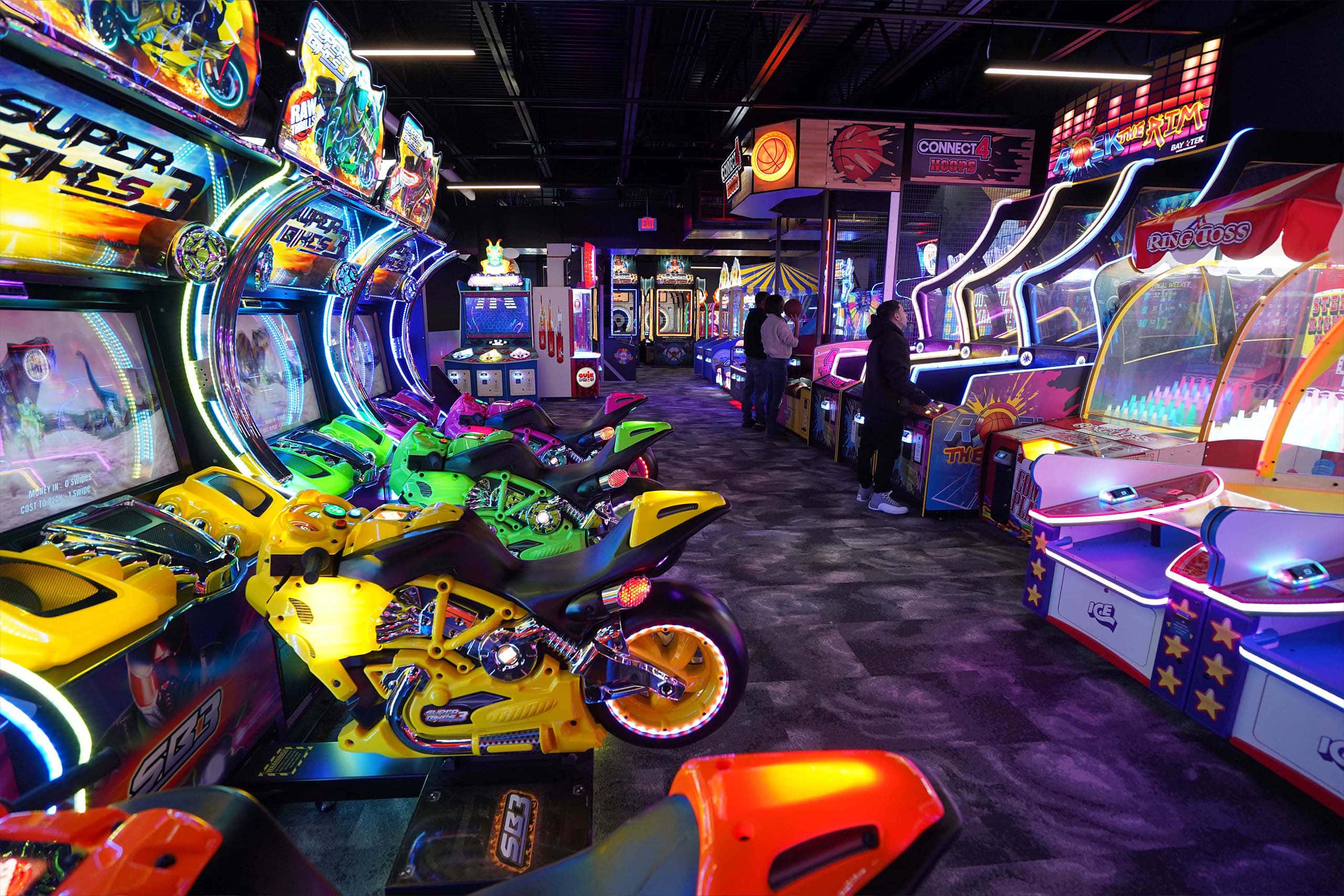 Arcade Games, glowing racing game machines, neon lights, 2K Desktop Wallpaper