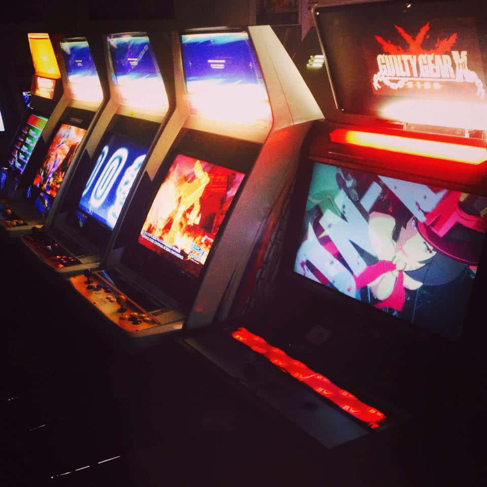 Retro Arcade Game, glowing arcade machines, vibrant game screens, SD Desktop Wallpaper