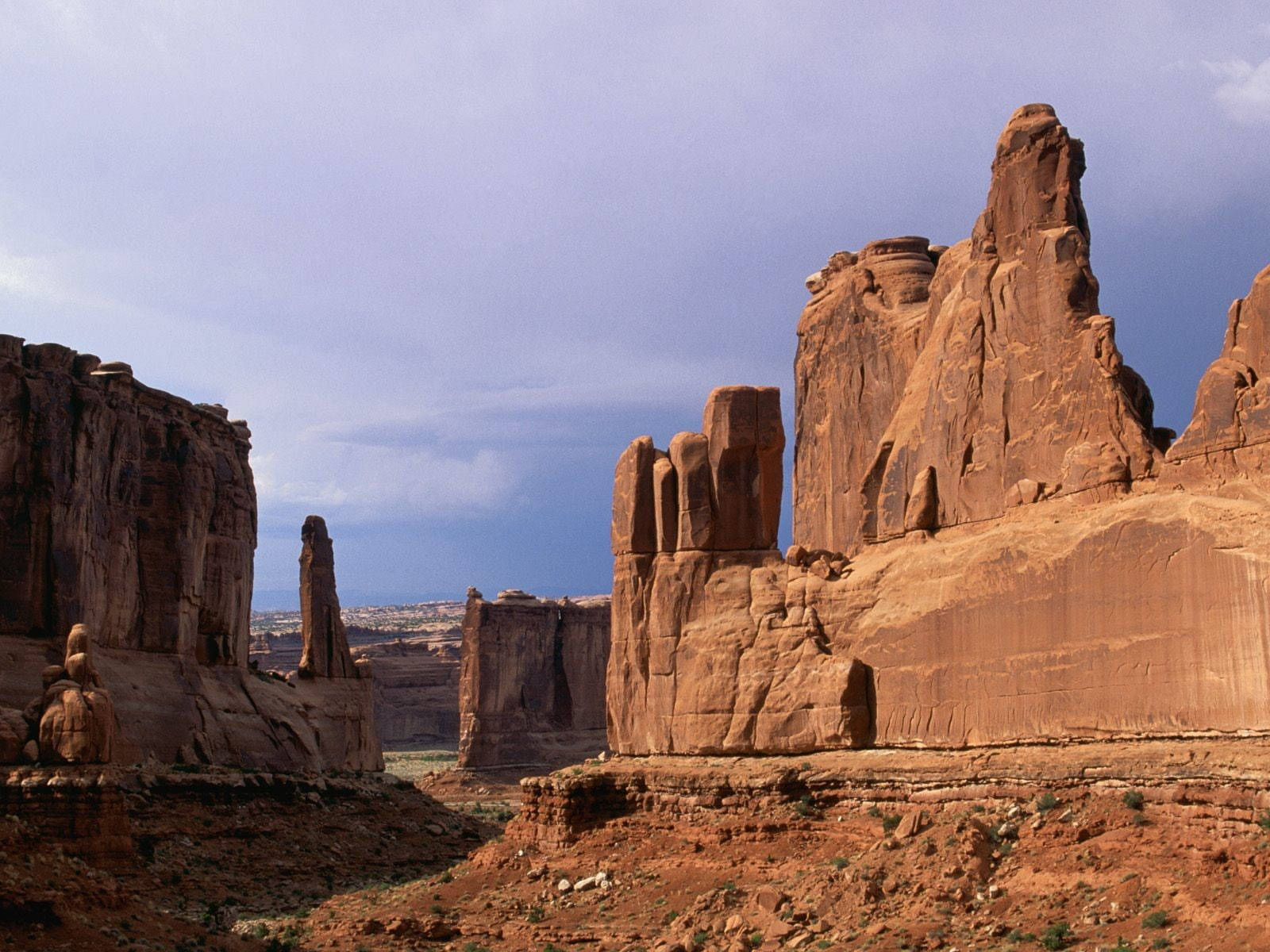 Arches National Park, red sandstone formations, moody overcast sky, HD Desktop Wallpaper