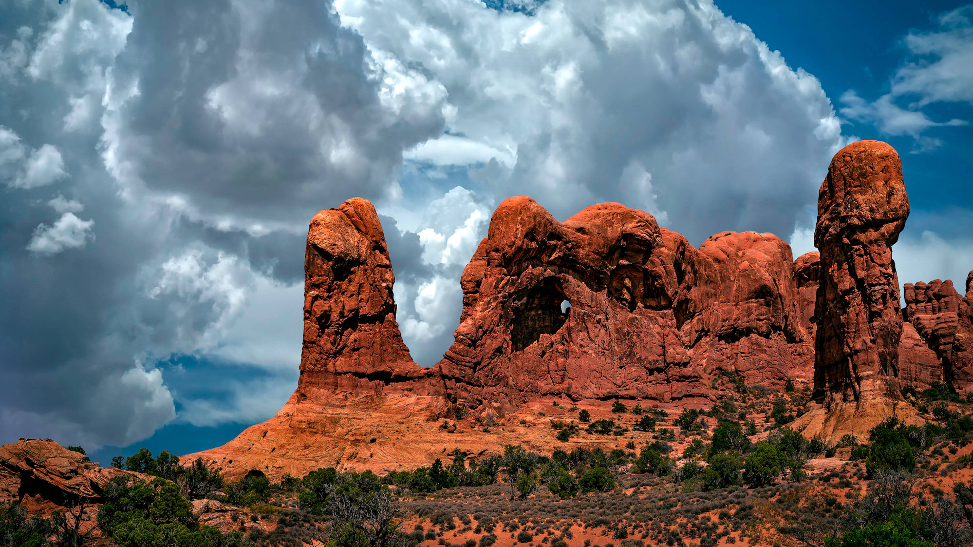 Arches National Park, red rock formations, stormy sky, 4K Desktop Wallpaper
