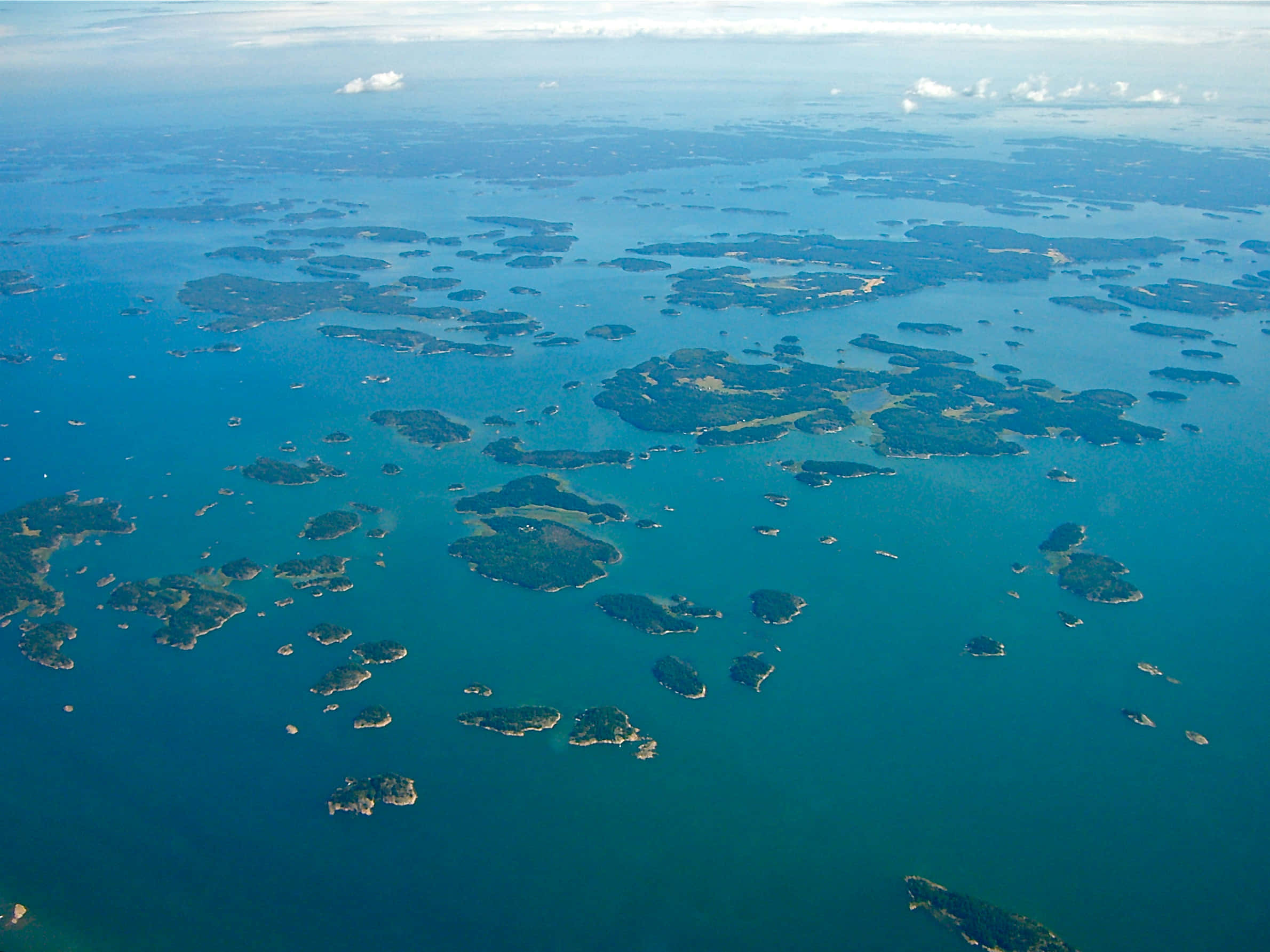 coastal archipelago, lush green islands, vibrant turquoise waters, Full HD Desktop Wallpaper