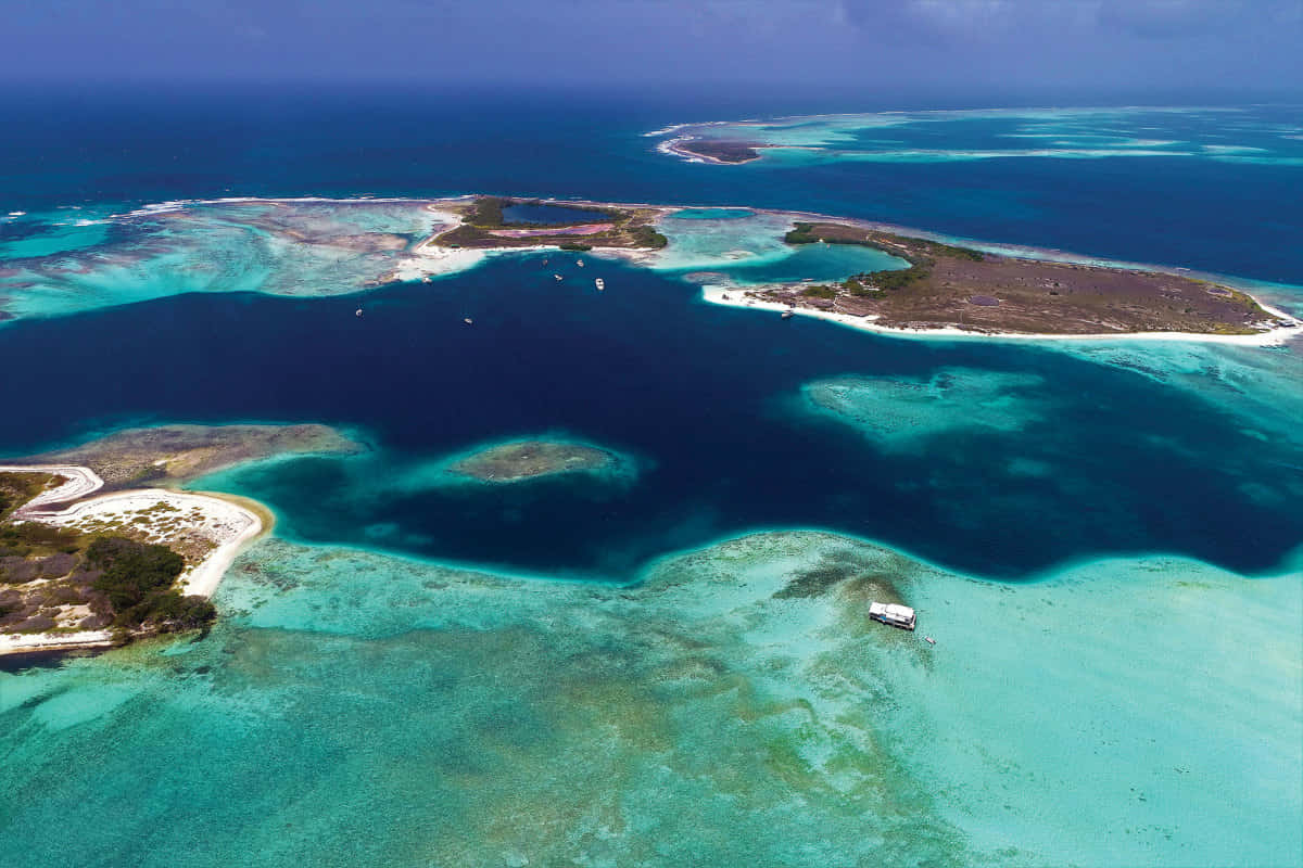 tropical atoll, turquoise lagoons, dark blue ocean, SD Desktop Wallpaper