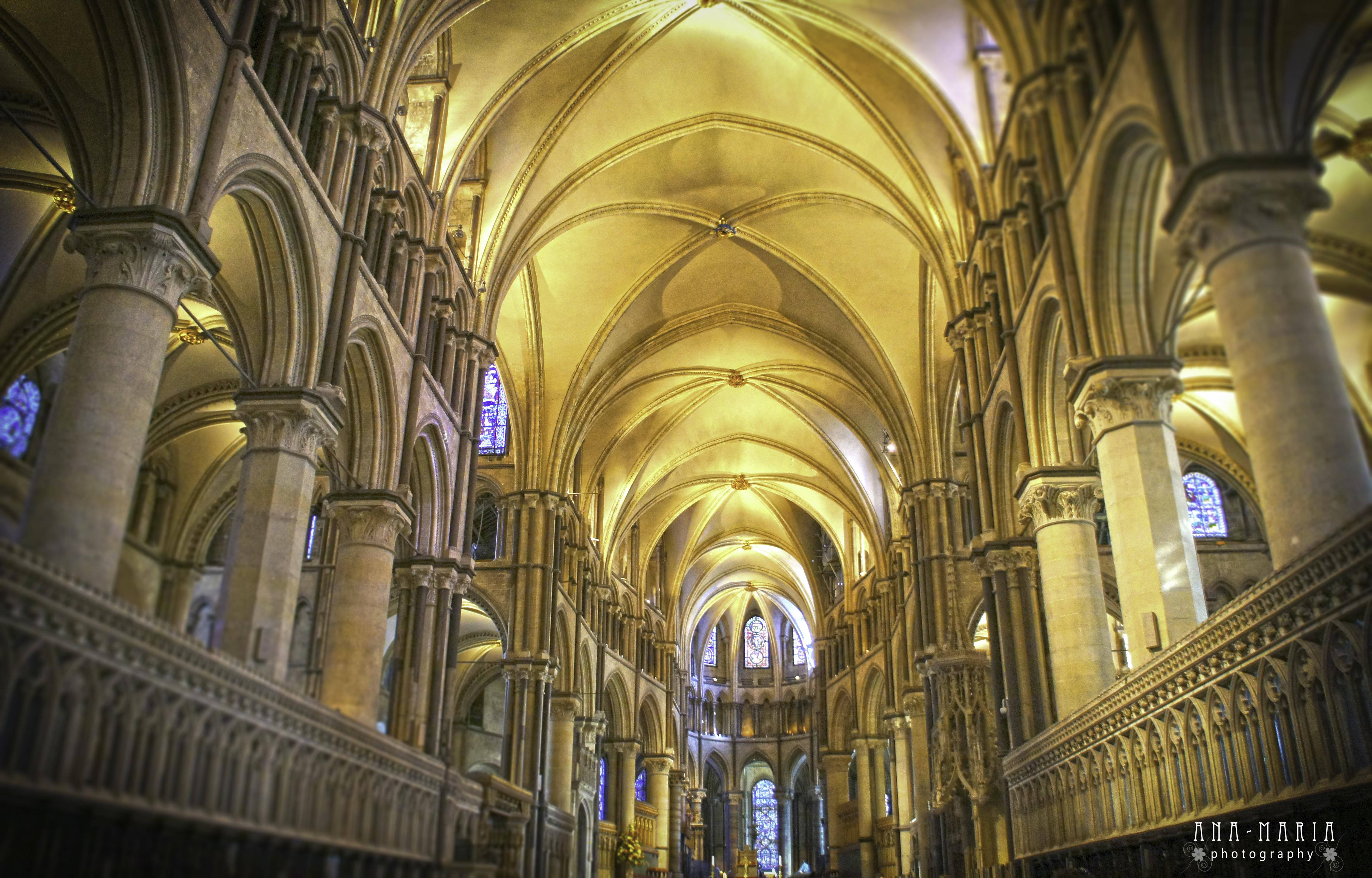 cathedral interior, stone vaulted ceilings, golden lighting, 4K Desktop Wallpaper