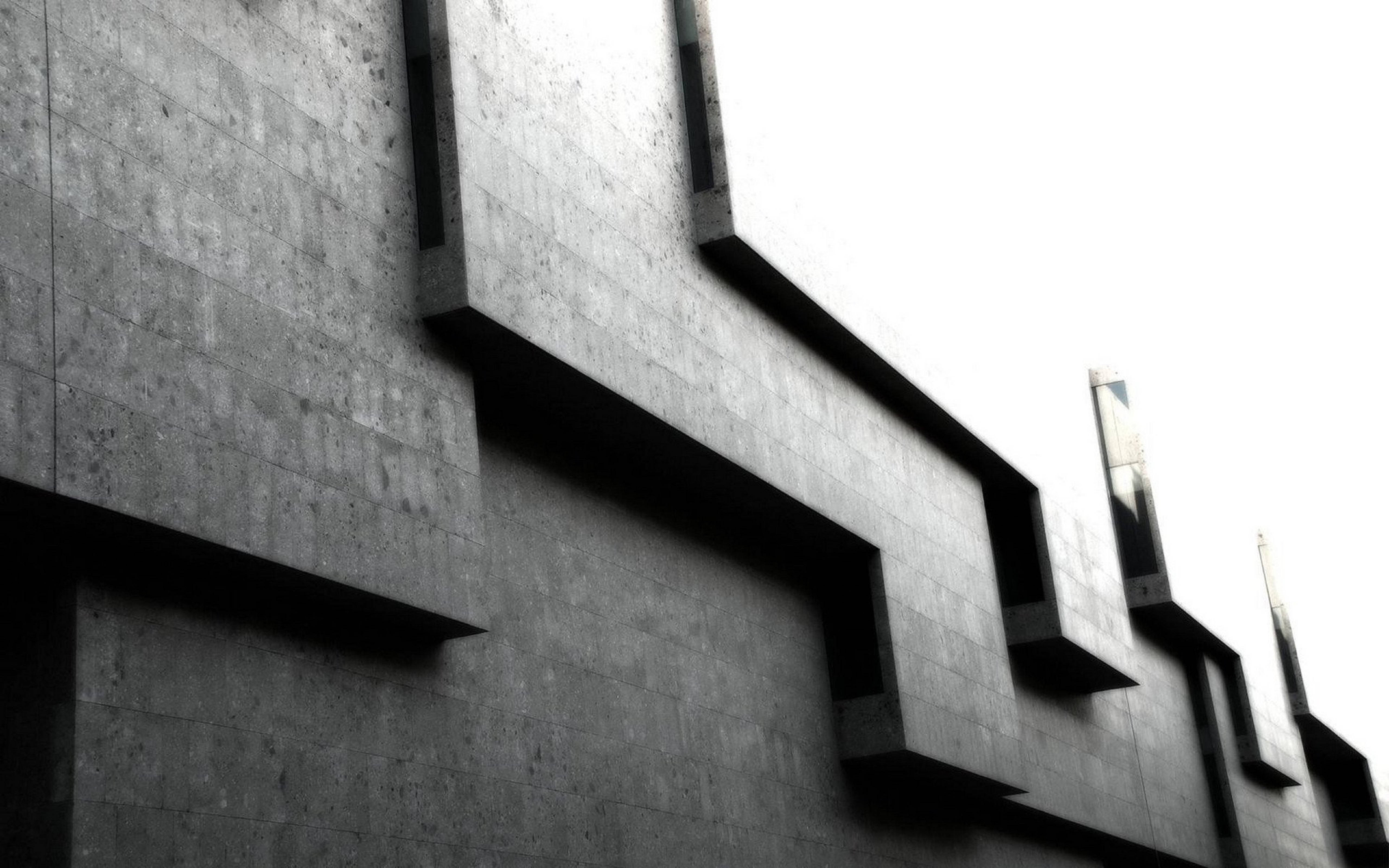 brutalist concrete building, sharp geometric lines, deep shadows, 5K Desktop Wallpaper