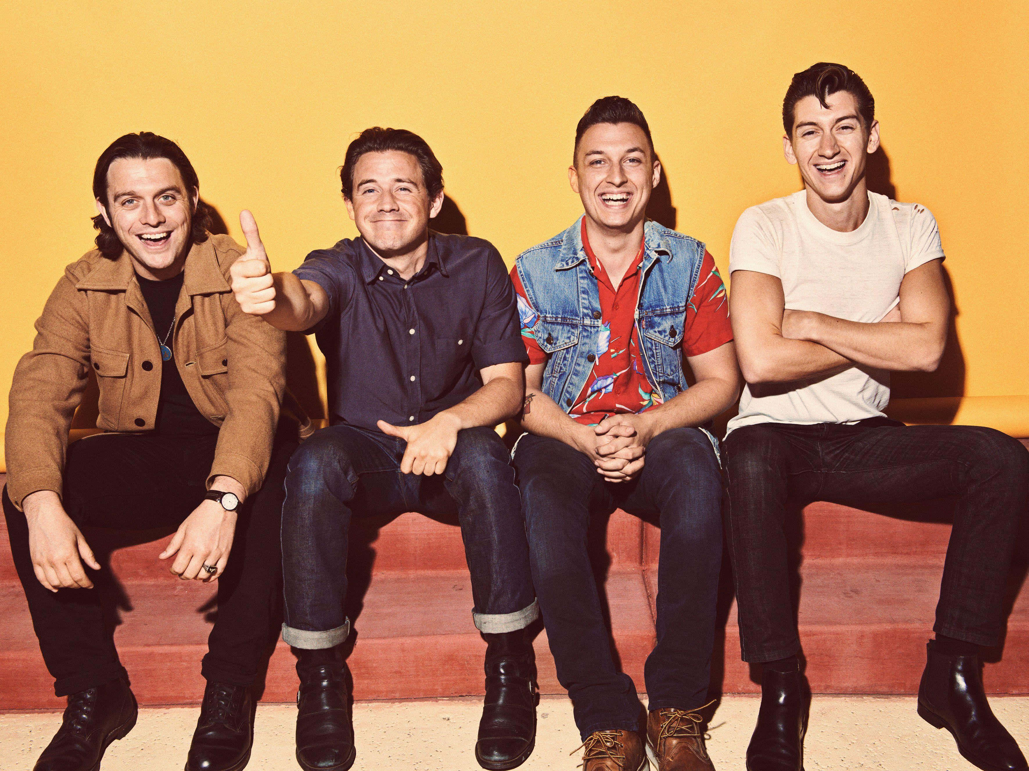 Arctic Monkeys, yellow background, red steps, 2K Desktop Wallpaper