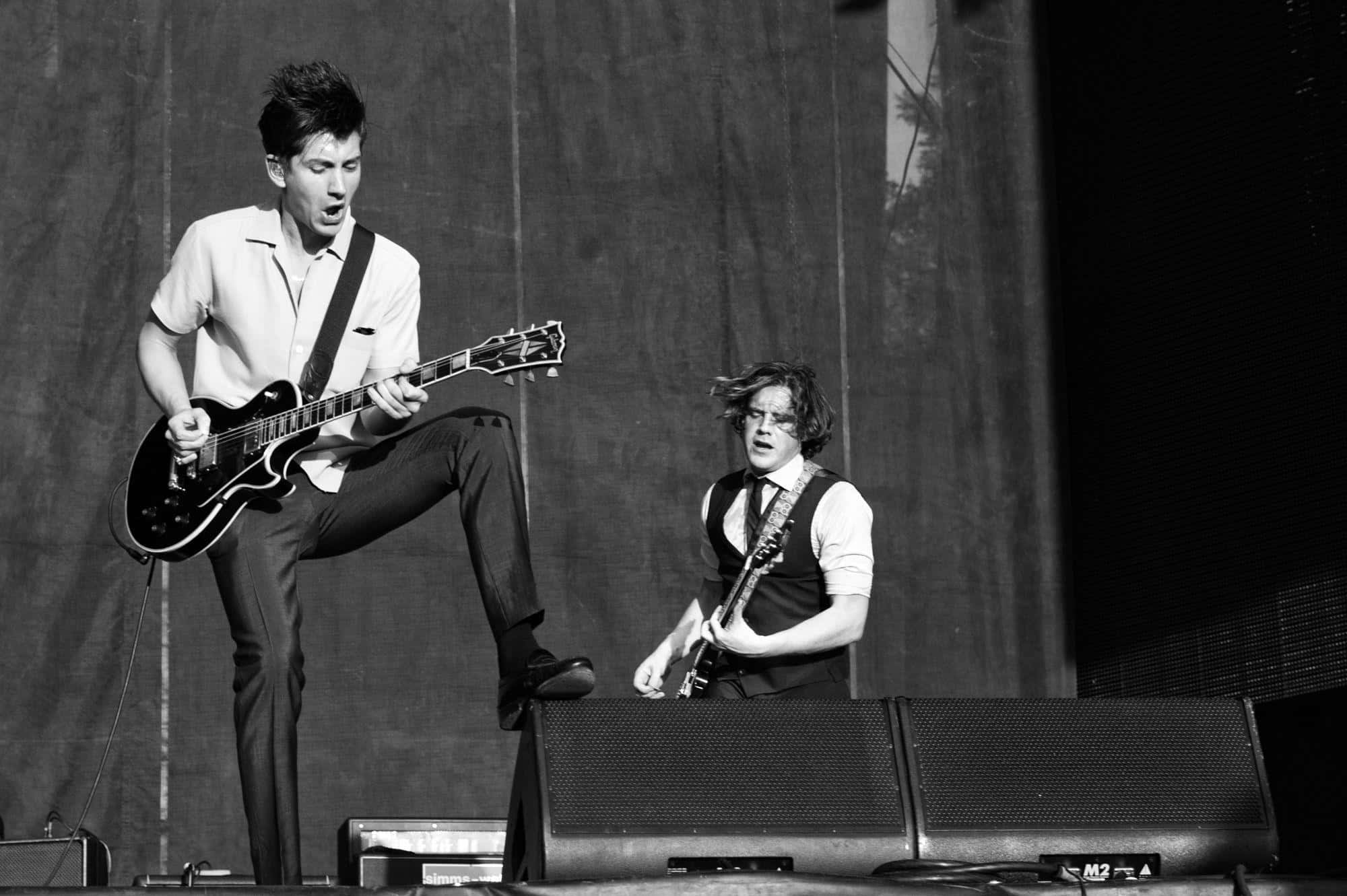 Arctic Monkeys, electric guitars, dimly lit stage, Full HD Desktop Wallpaper