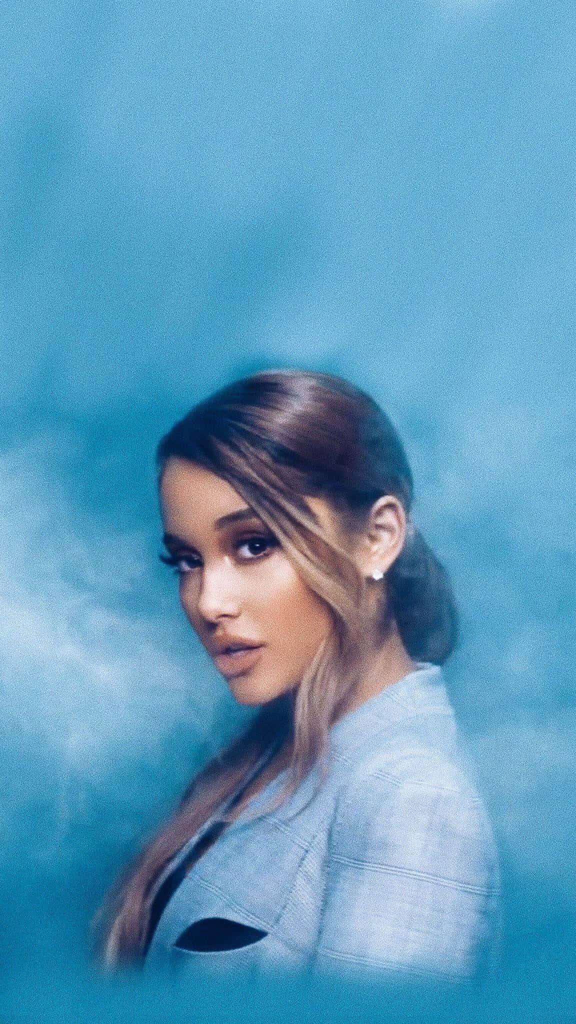Ariana Grande, hazy blue backdrop, smoky atmospheric lighting, Full HD Phone Wallpaper
