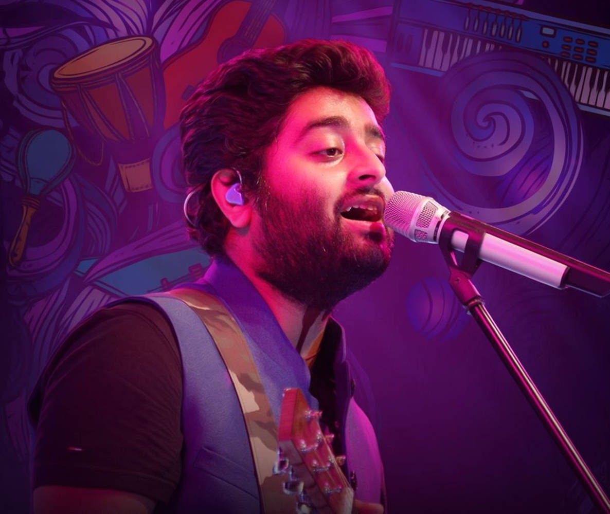 Arijit Singh, vibrant purple stage lights, microphone, SD Desktop Wallpaper