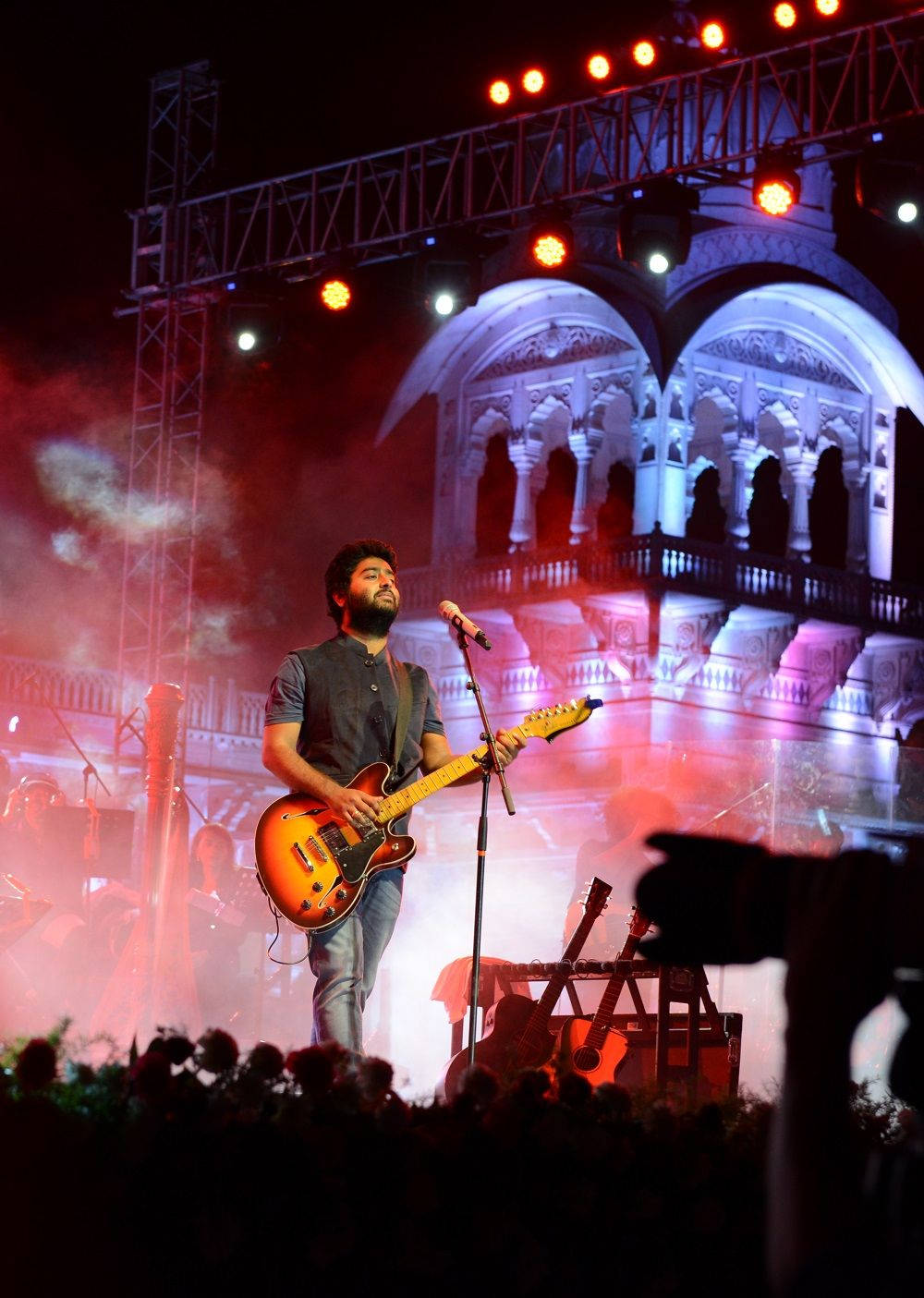 Arijit Singh, sunburst electric guitar, vibrant stage lights, HD Phone Wallpaper