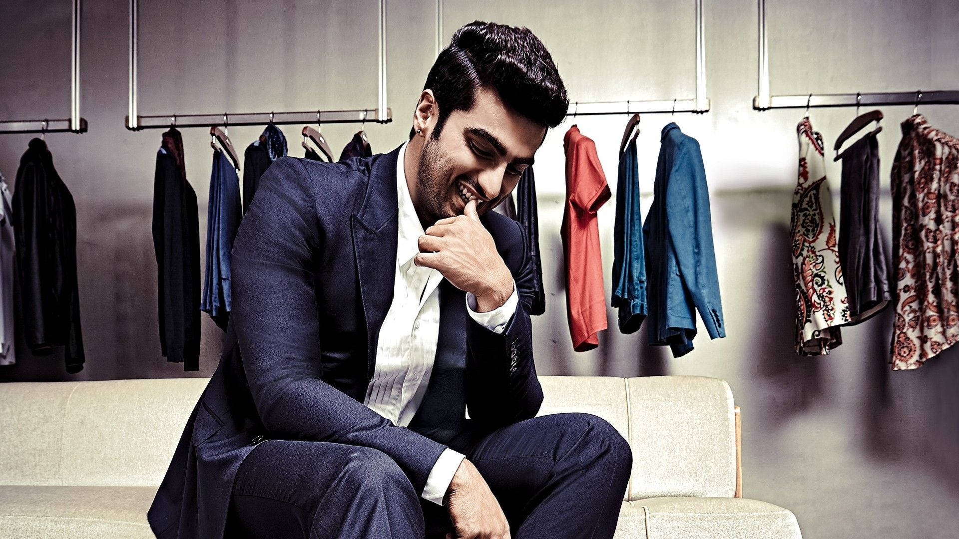 Arjun Kapoor, navy suit, beige couch, Full HD Desktop Wallpaper