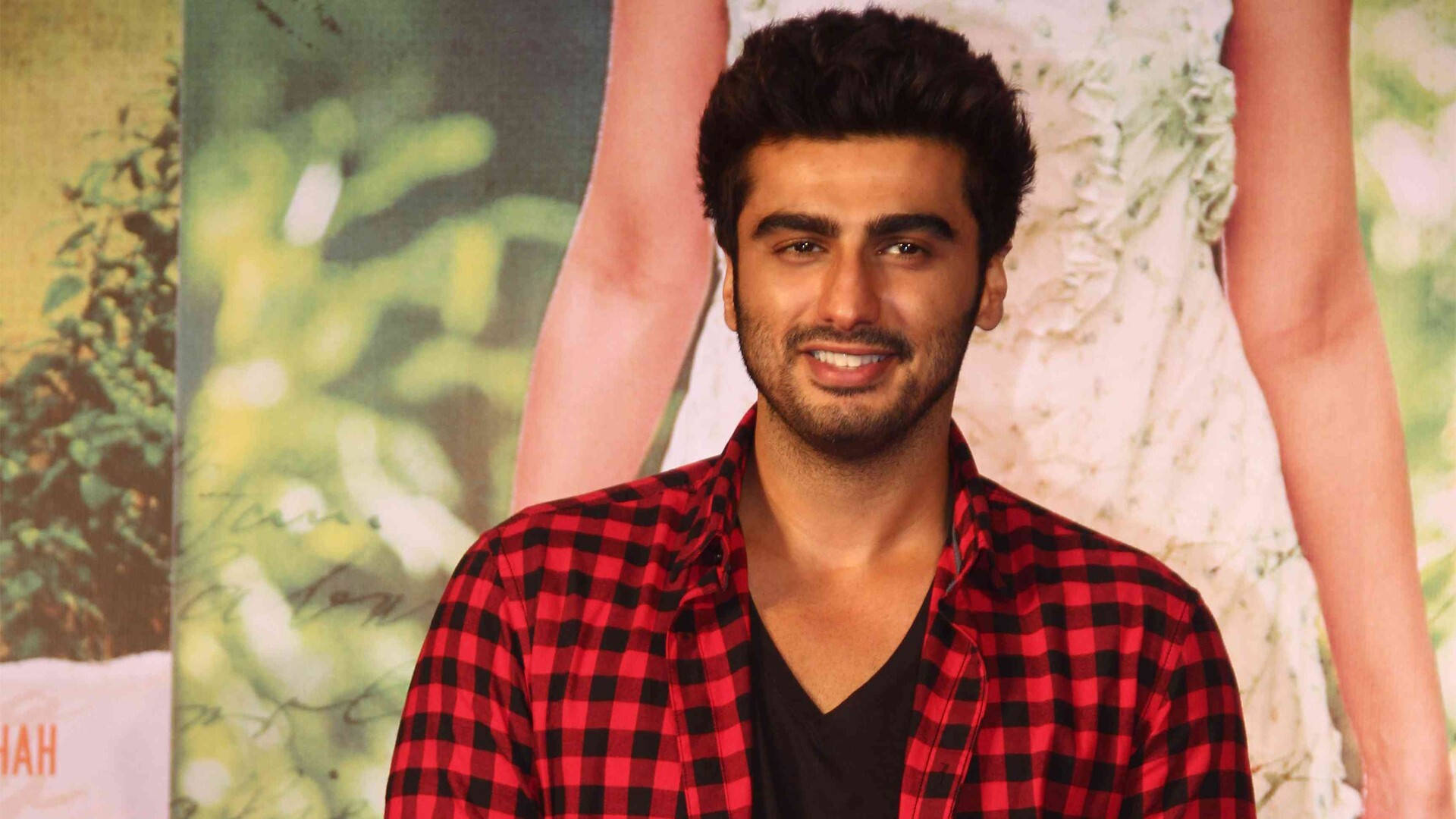 Arjun Kapoor, red and black checkered shirt, blurred green and white backdrop, Full HD Desktop Wallpaper
