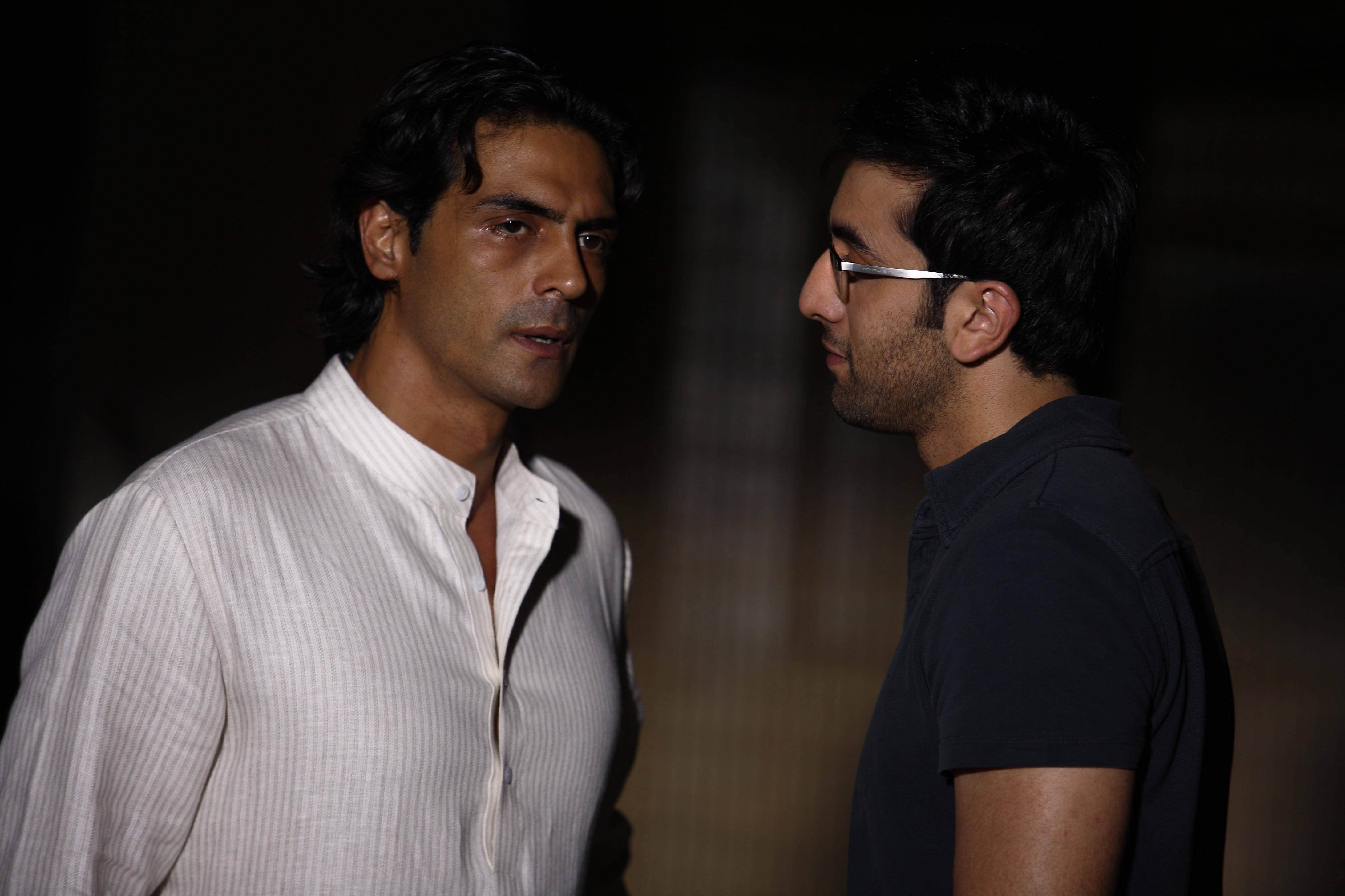 Arjun Rampal, dimly lit room, tense conversation, 4K Desktop Wallpaper