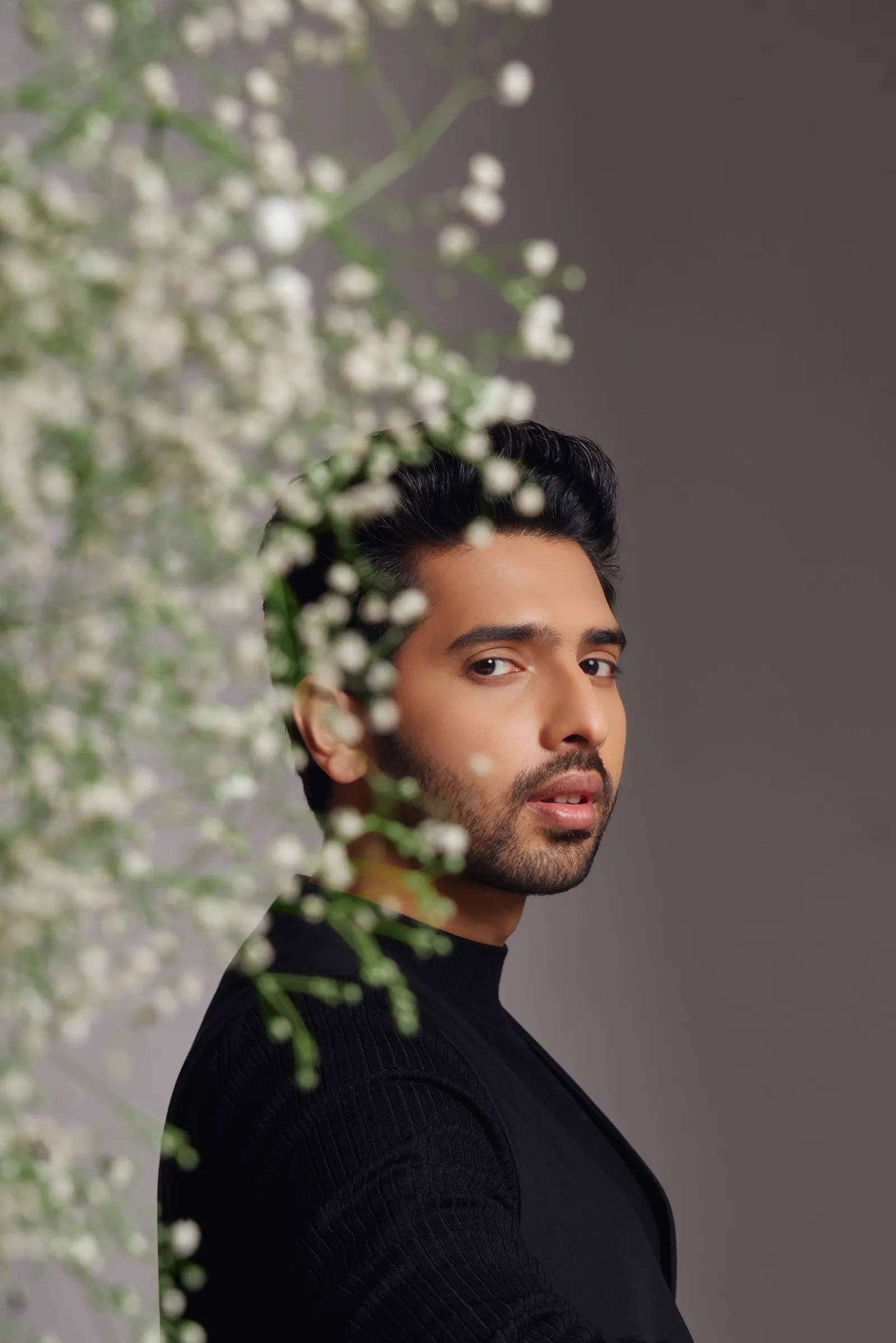 Armaan Malik, black turtleneck, white baby's breath flowers, Full HD Phone Wallpaper