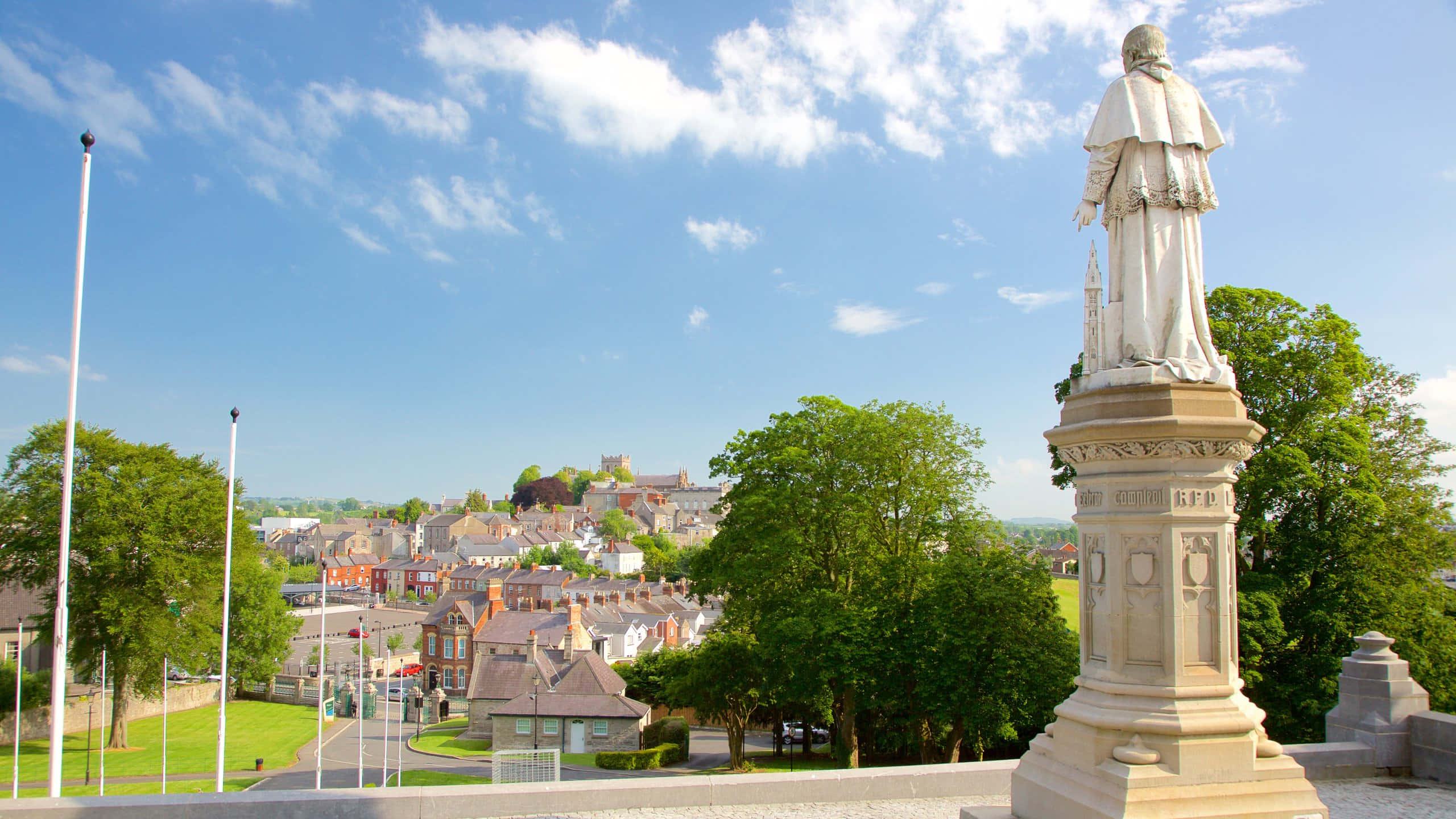 Armagh, white stone statue, sunlit town, 2K Desktop Wallpaper