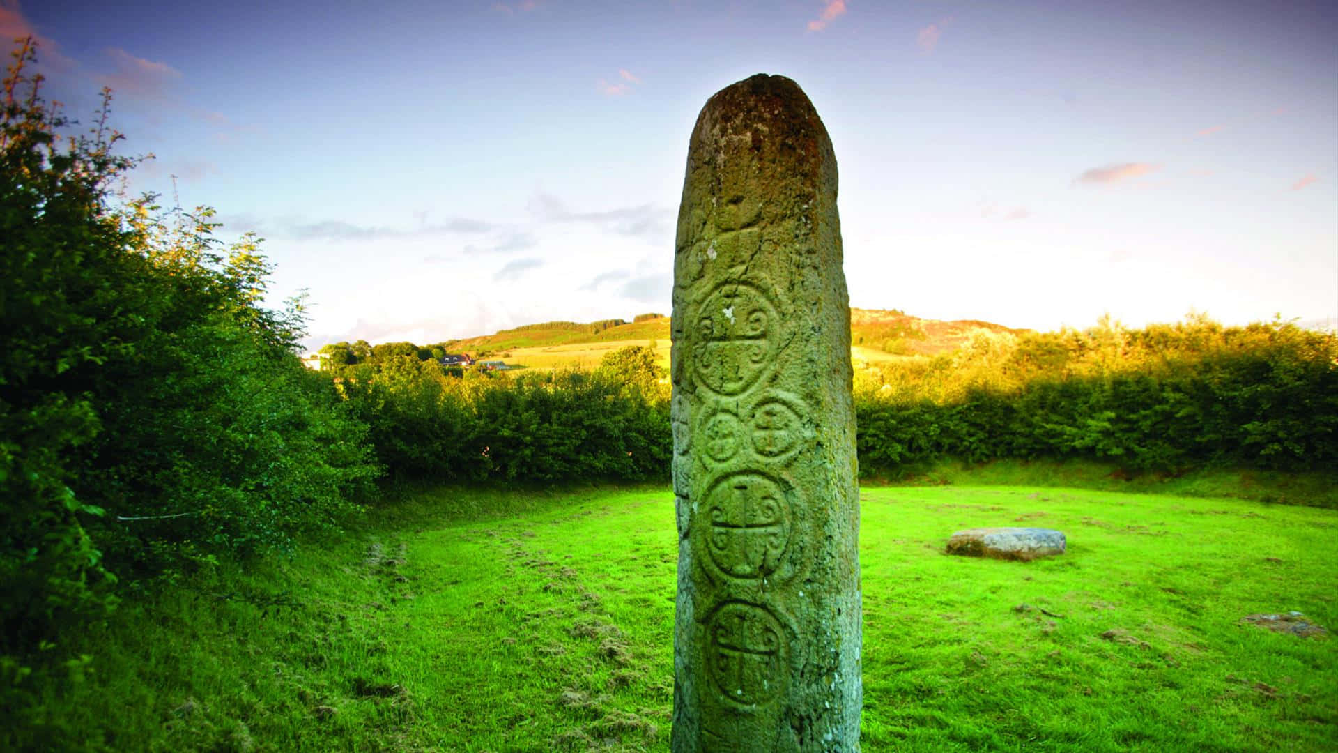 Armagh, ancient standing stone, vibrant green field, Full HD Desktop Wallpaper