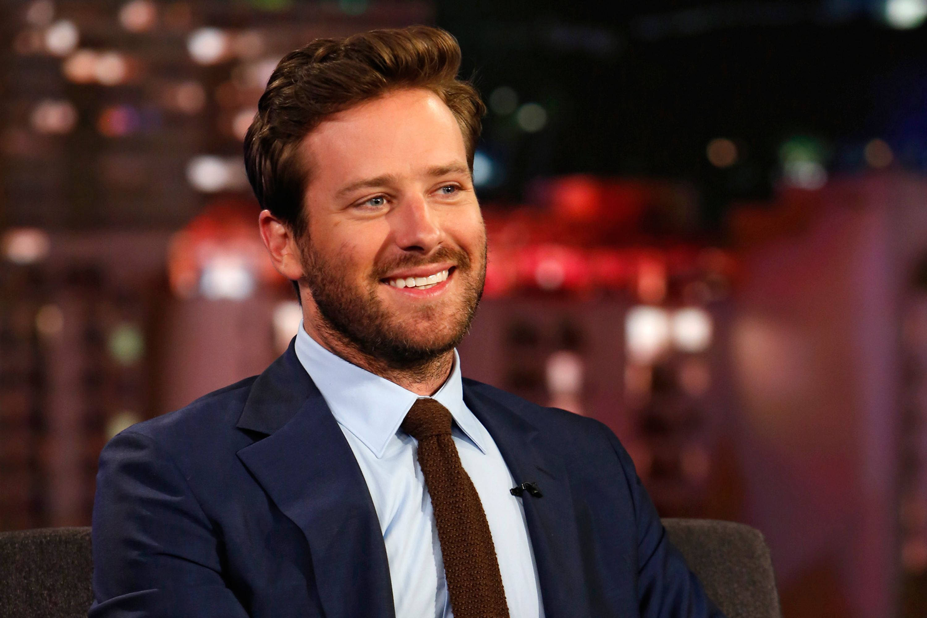 Armie Hammer, blue suit, brown tie, 2K Desktop Wallpaper
