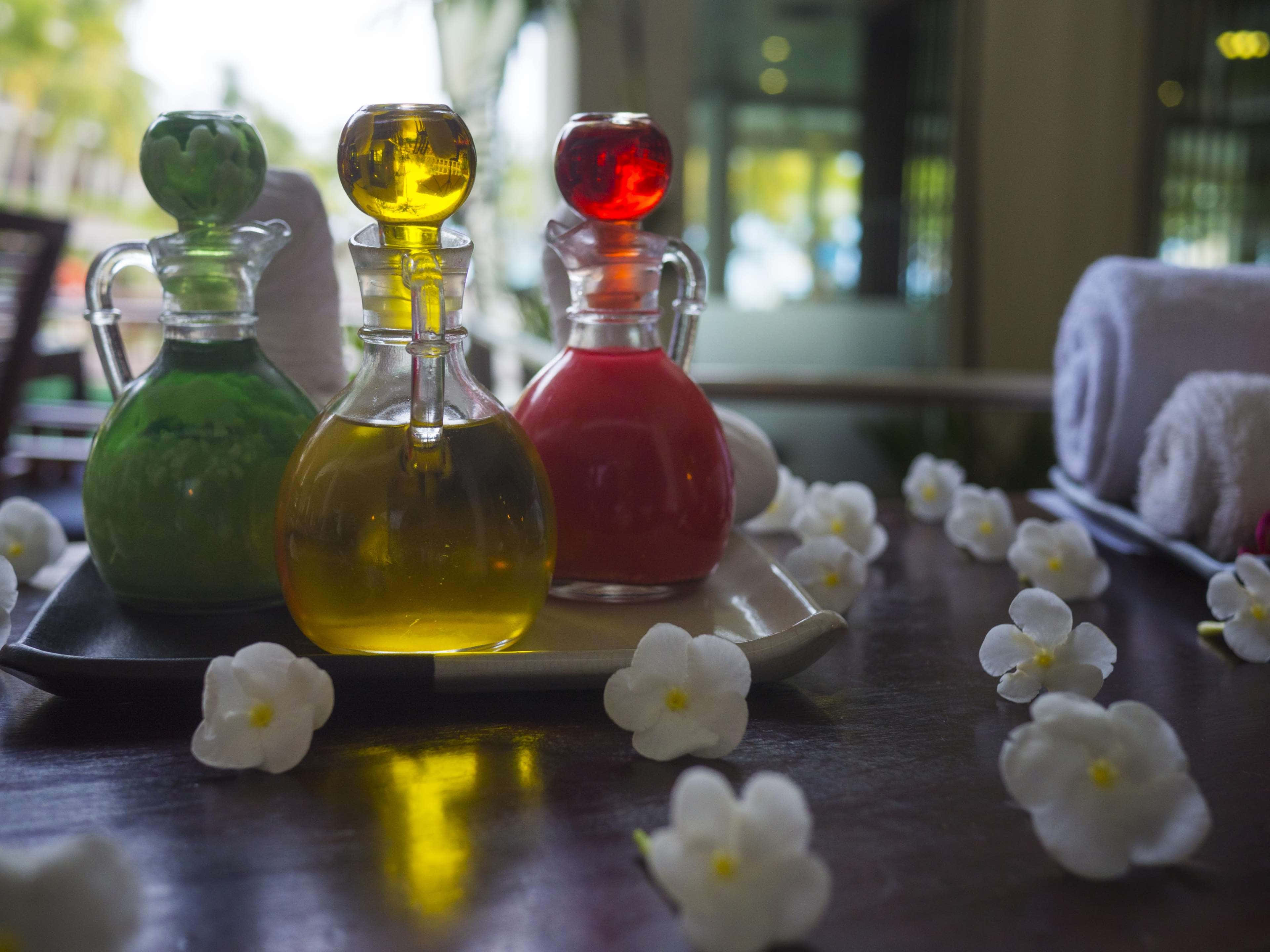 Aromatherapy, three colored oil bottles, spherical stoppers, 4K Desktop Wallpaper