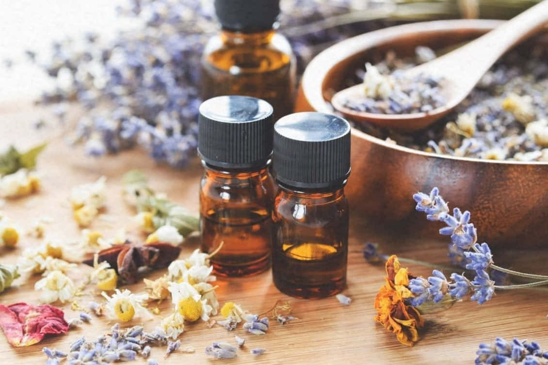 amber essential oil bottles, wooden surface, dried lavender, SD Desktop Wallpaper