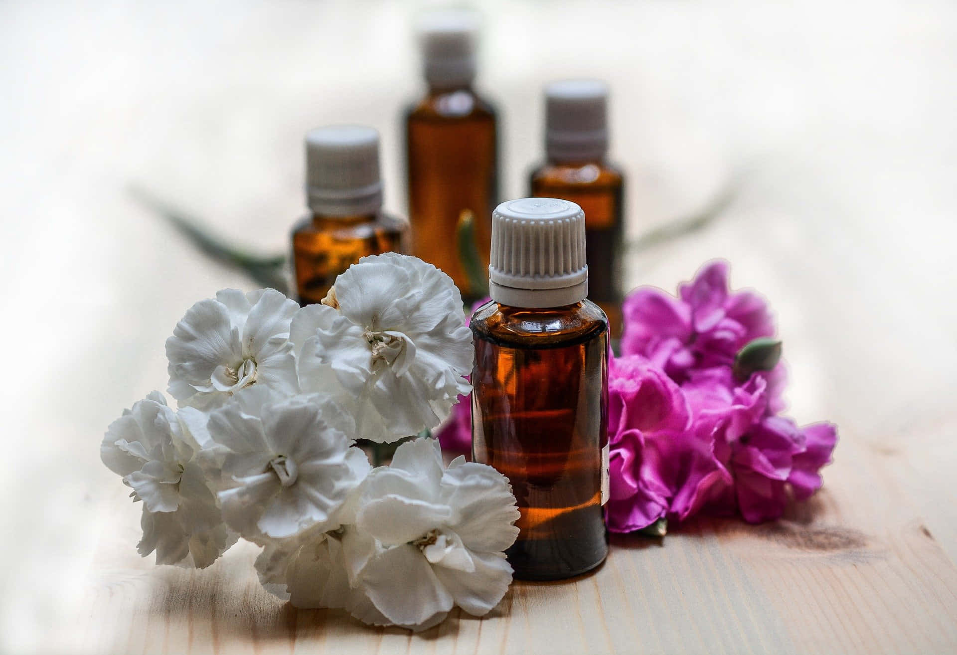 Aromatherapy, amber glass essential oil bottles, white and purple carnations, Full HD Desktop Wallpaper