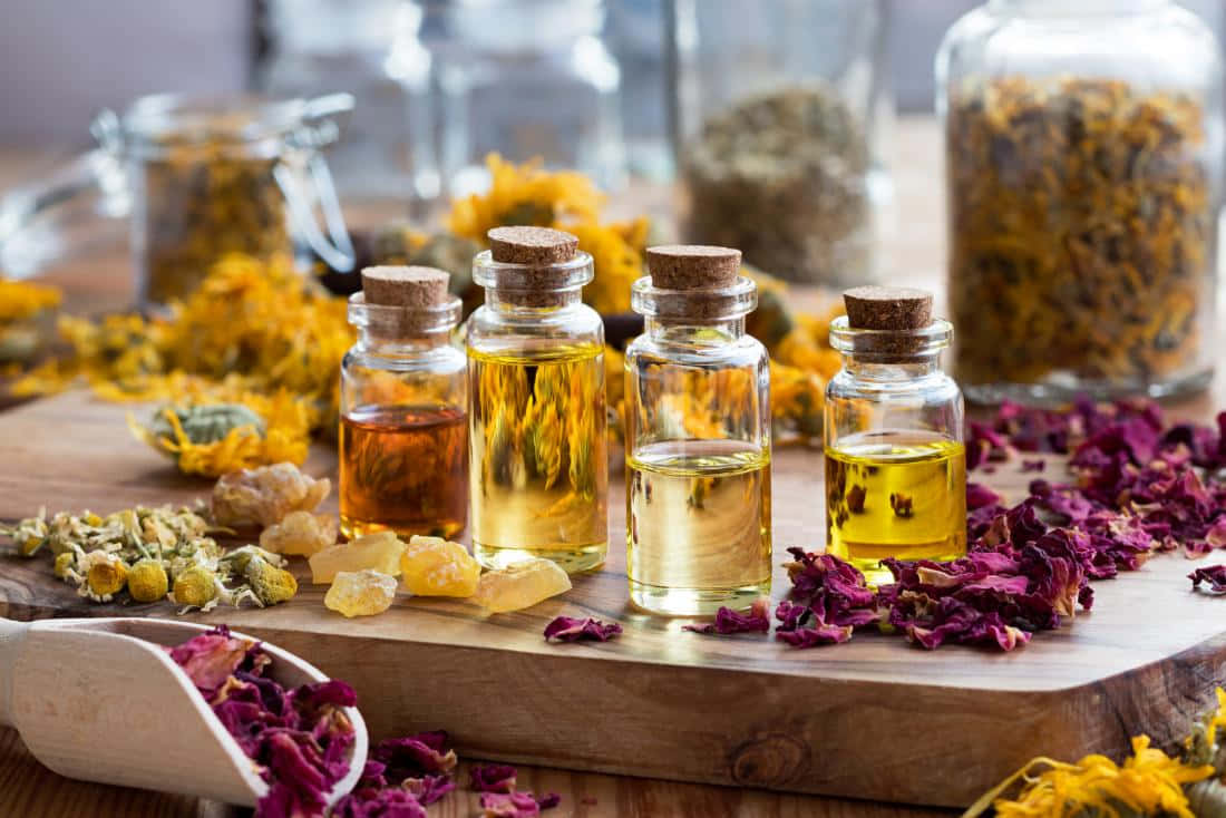 Aromatherapy, golden herbal oils, wooden board, SD Desktop Wallpaper