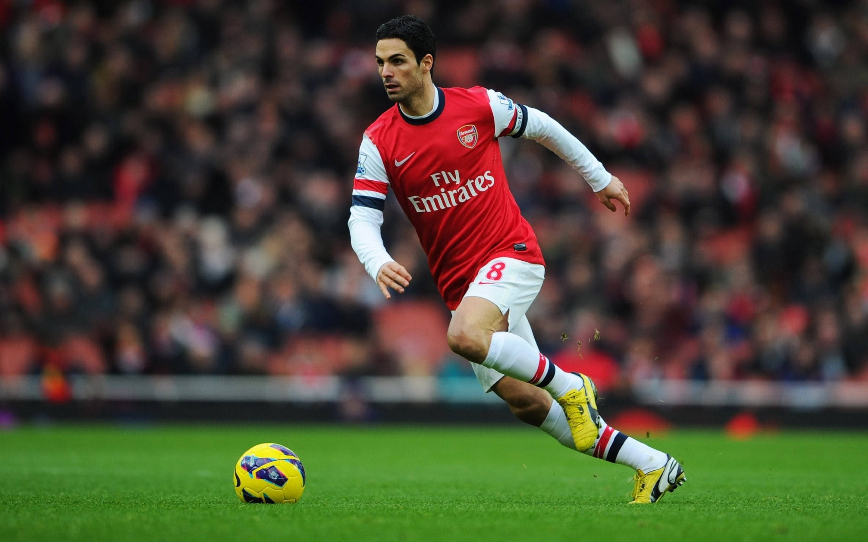 Arsenal FC, red Arsenal jersey, yellow ball, 2K Desktop Wallpaper