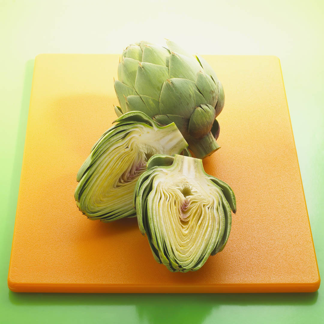 fresh artichoke, sliced in half, vibrant orange cutting board, SD Desktop Wallpaper