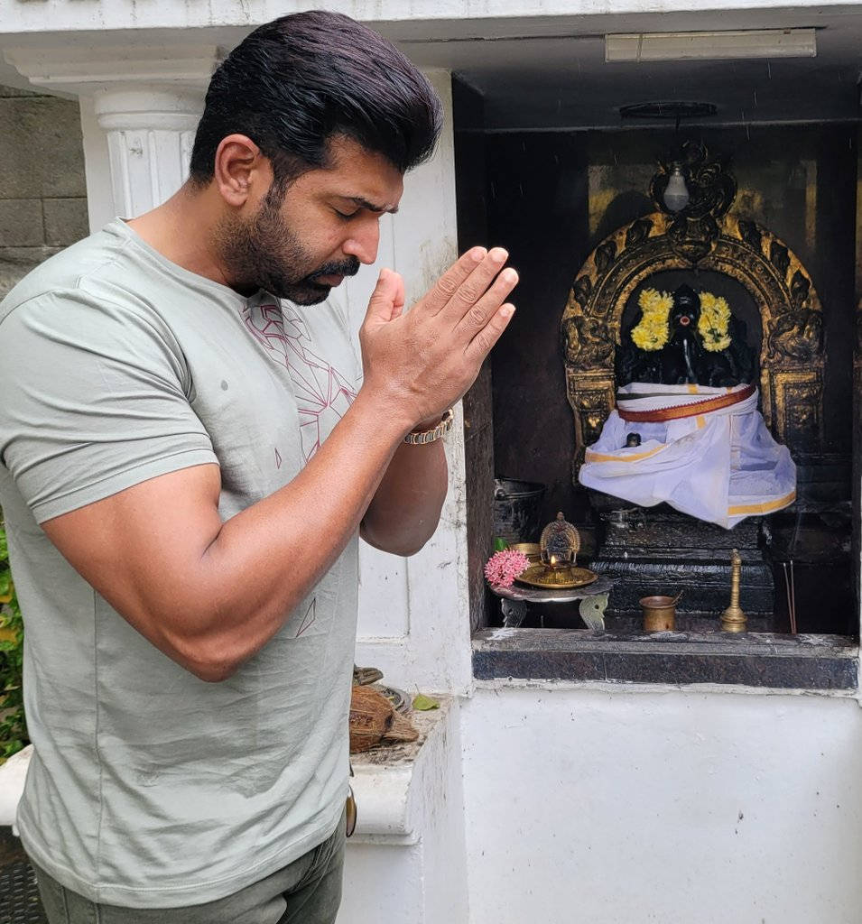 Arun Vijay, black deity, yellow flowers, SD Phone Wallpaper